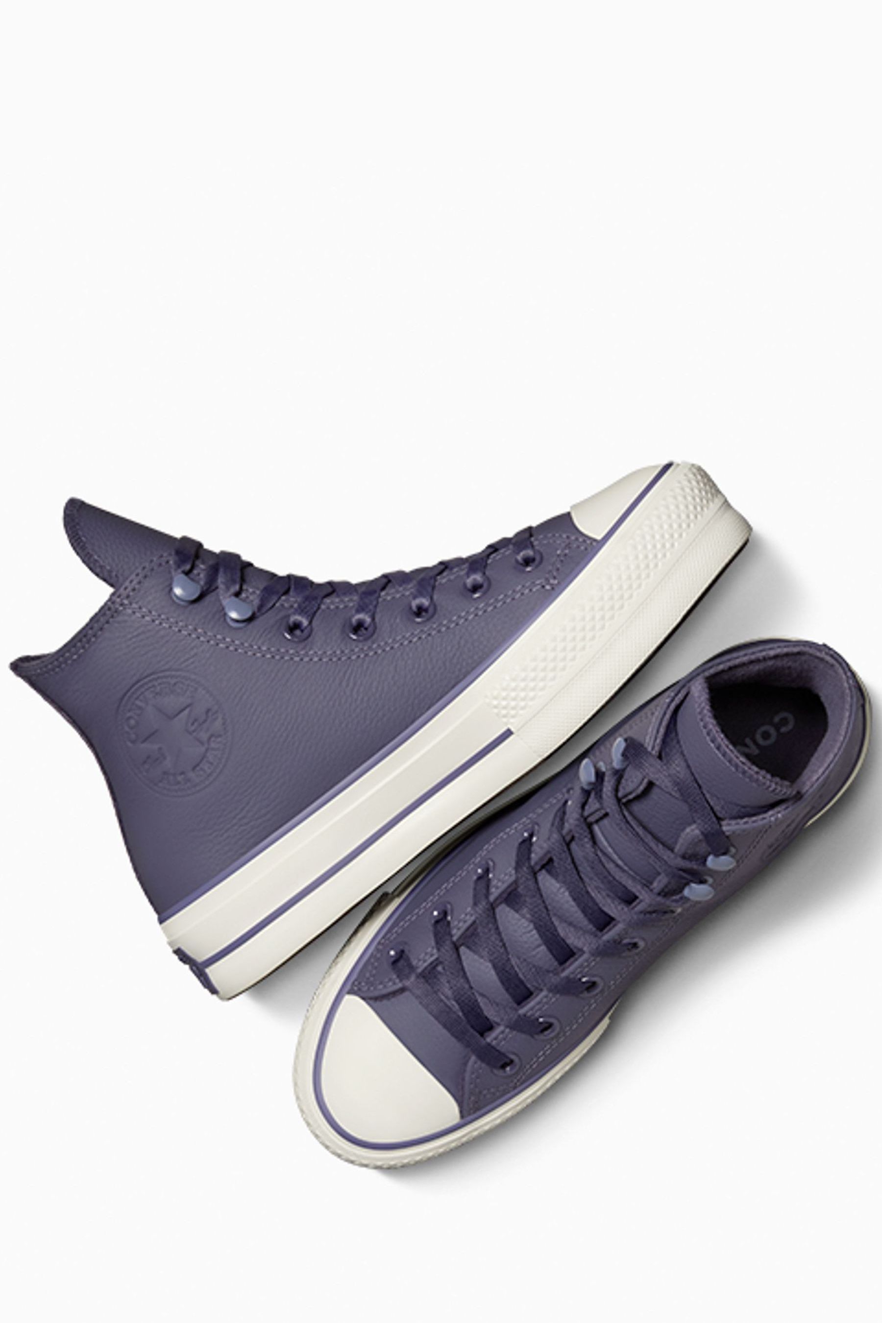 Converse purple leather sales