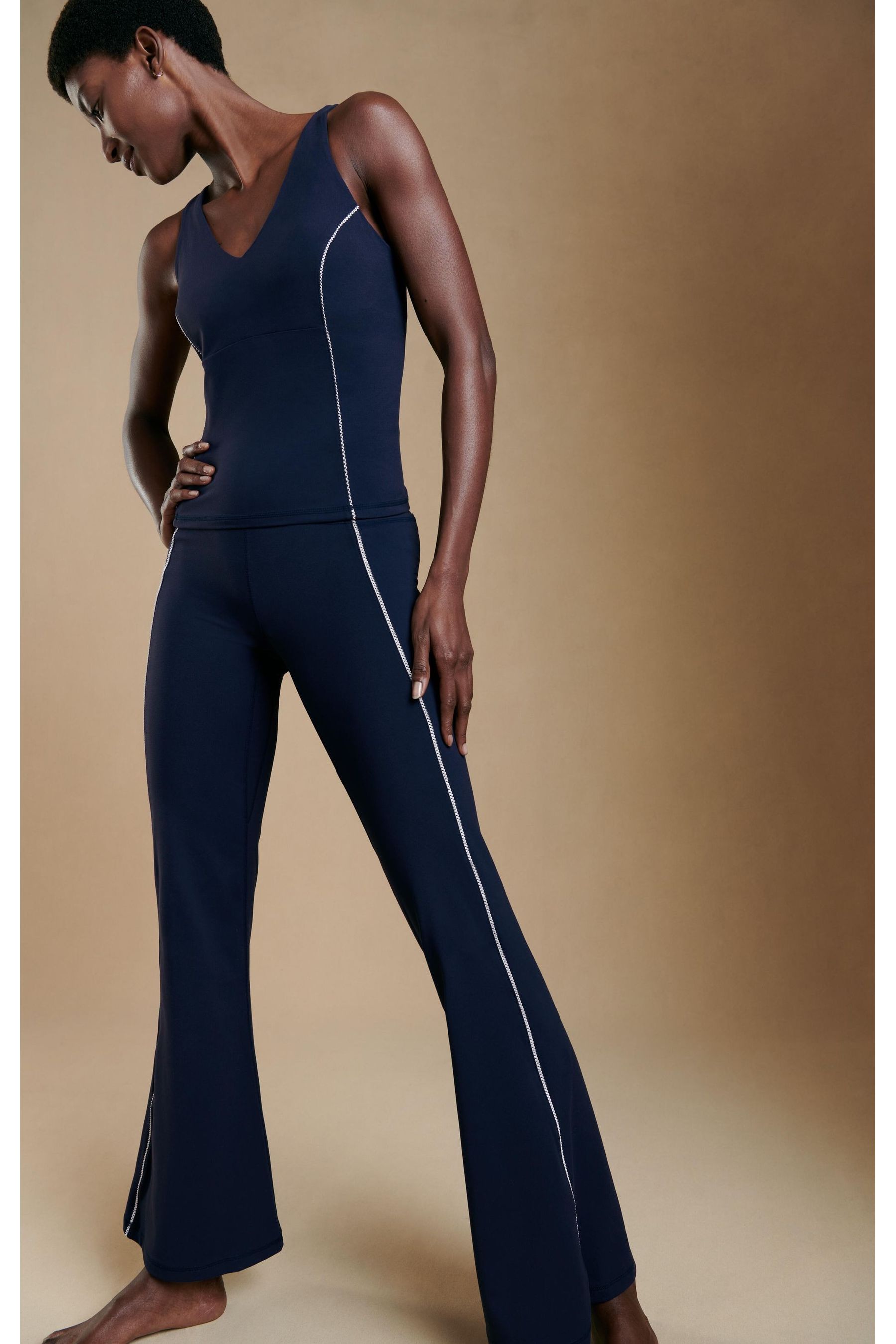Buy Sweaty Betty Navy Blue Super Soft Picot Lace Flare Trousers from the Next UK online shop