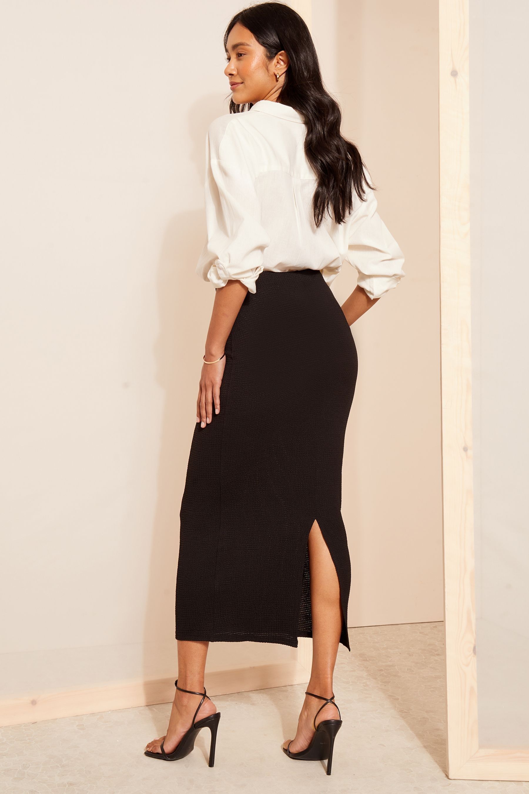 Buy Friends Like These Black Textured Jersey Midi Pencil Skirt from the Next UK online shop