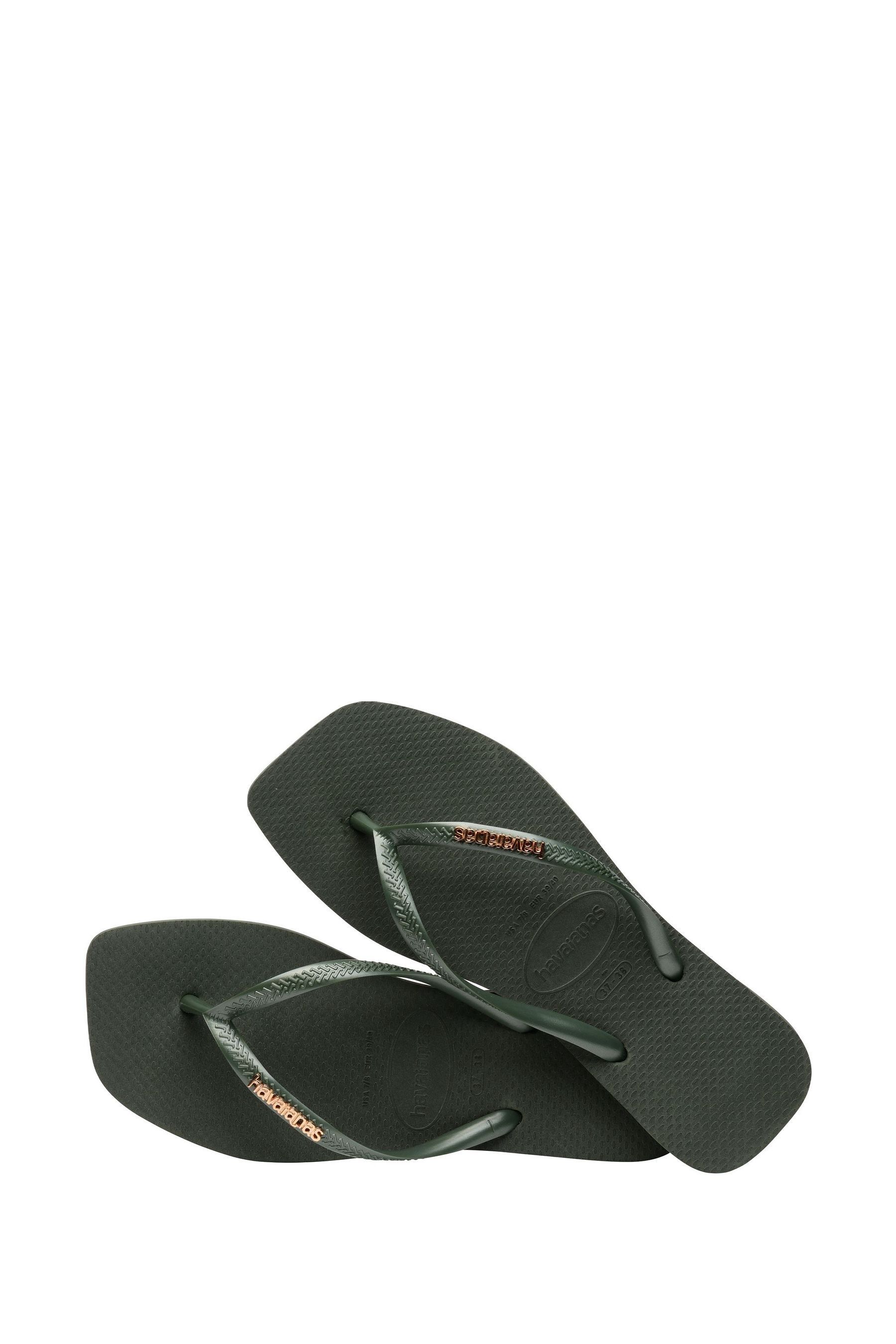 La saviata emblem slide sandal top