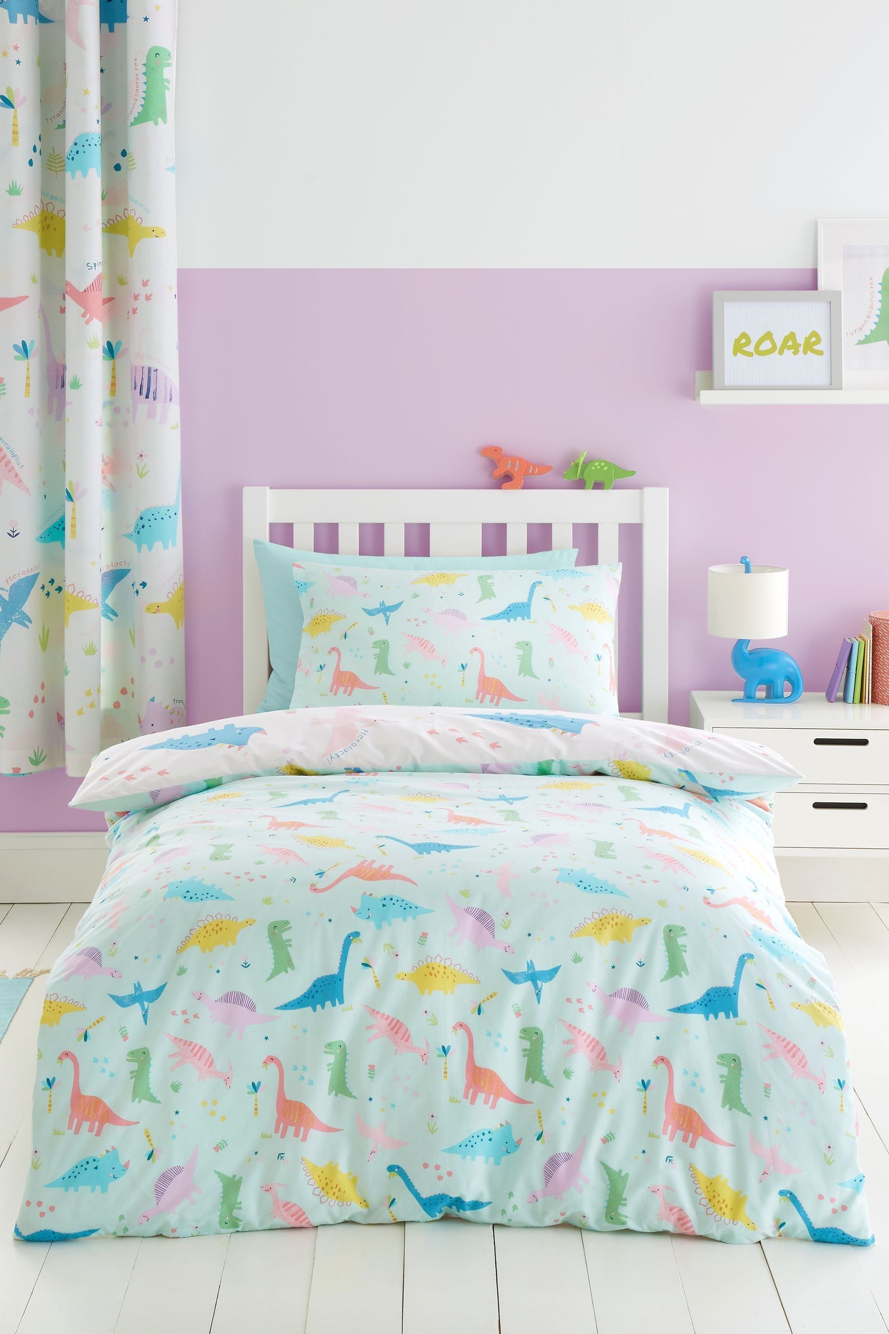 Pink dinosaur bedding top