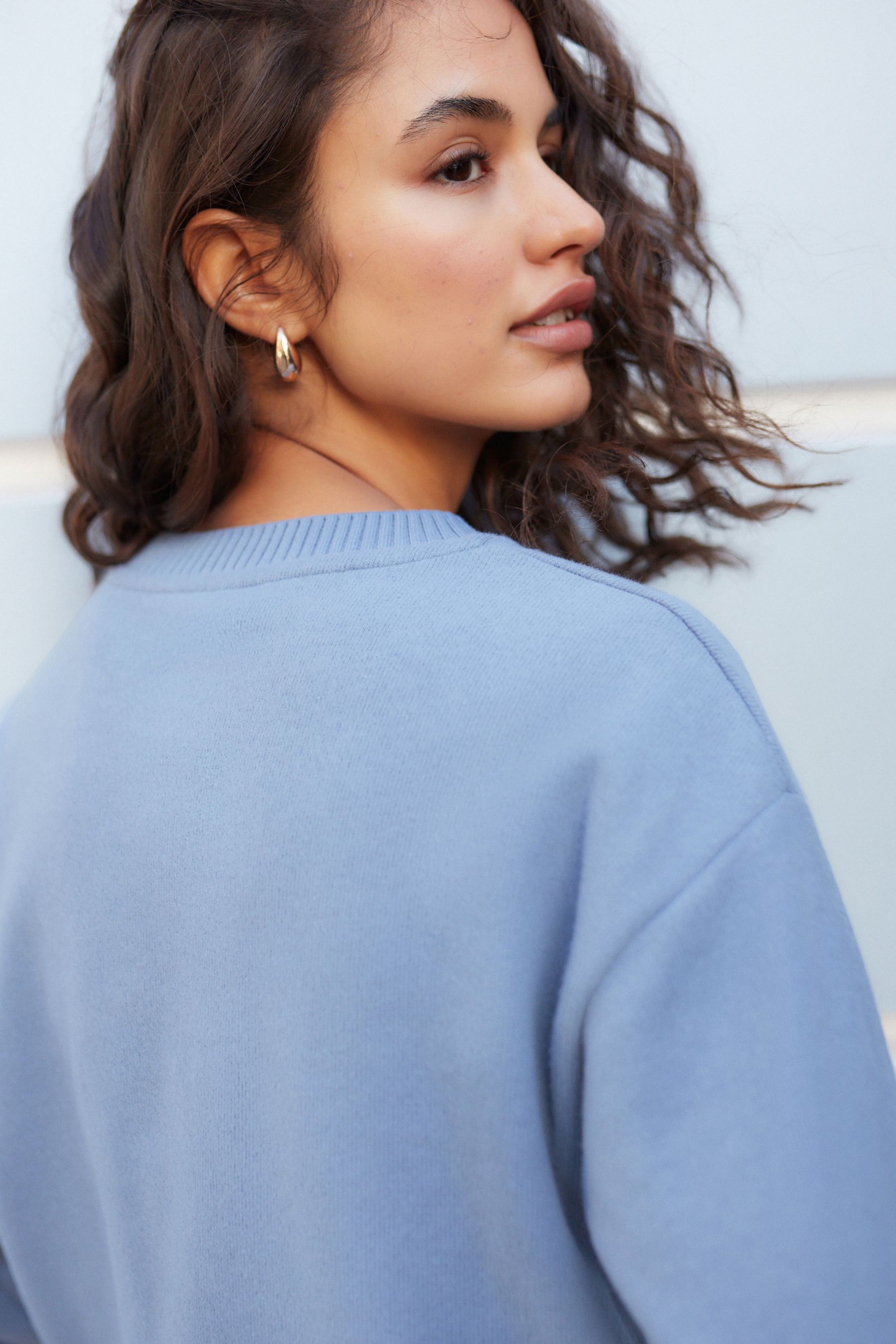 Pale blue crew neck jumper top
