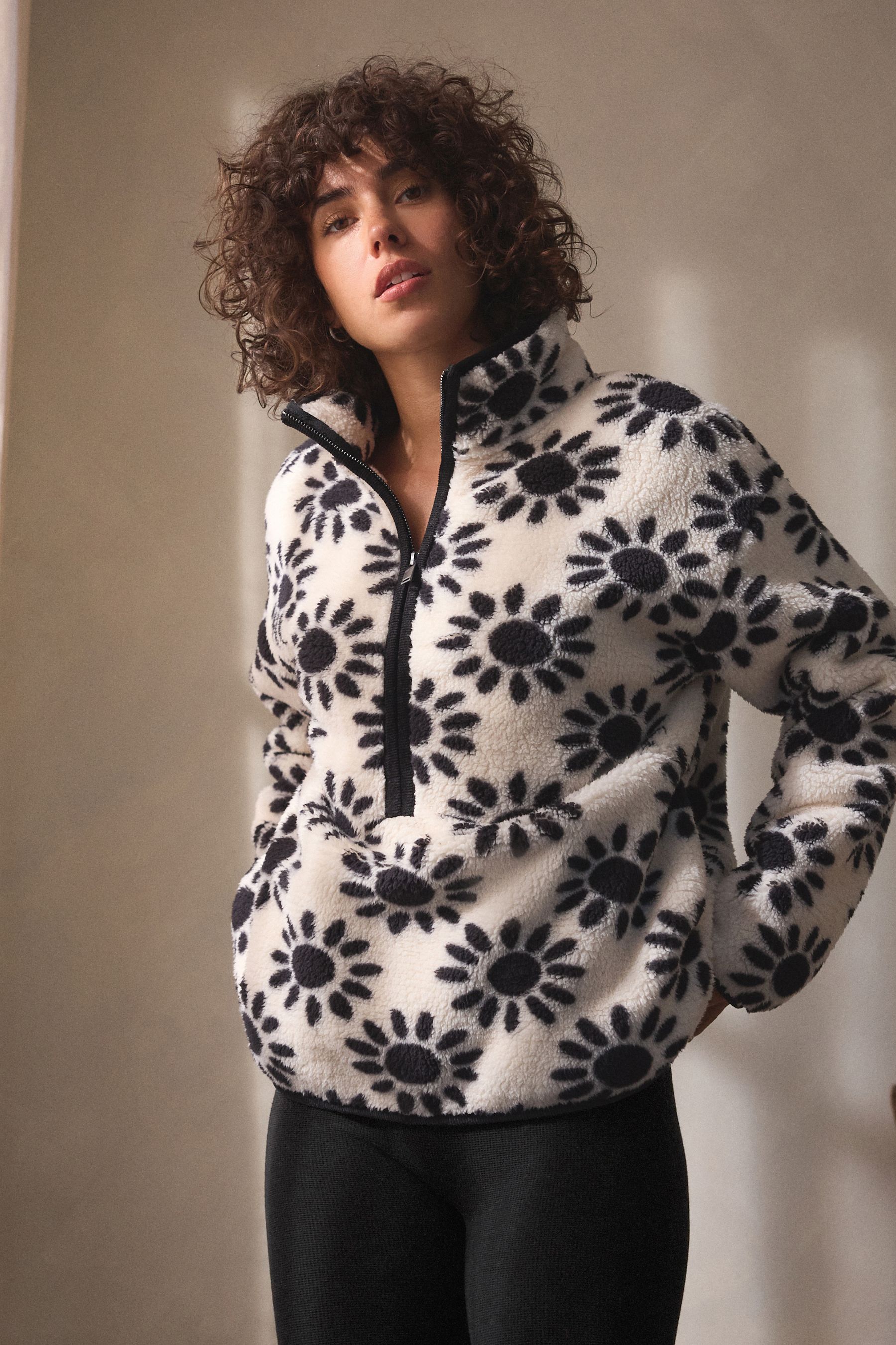 Nike zip through fleece in black and white animal print 2025