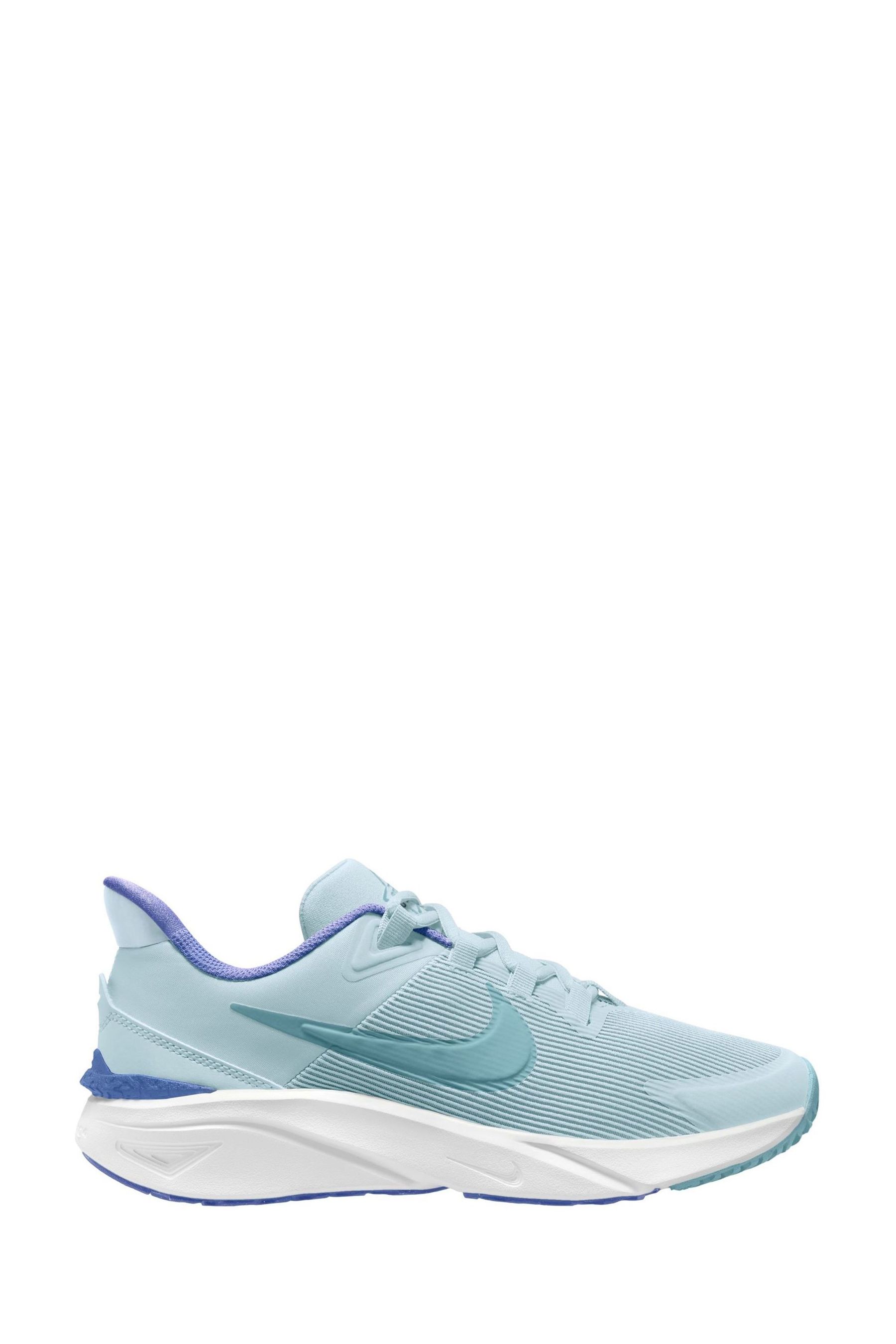 Nike trainers light blue sale