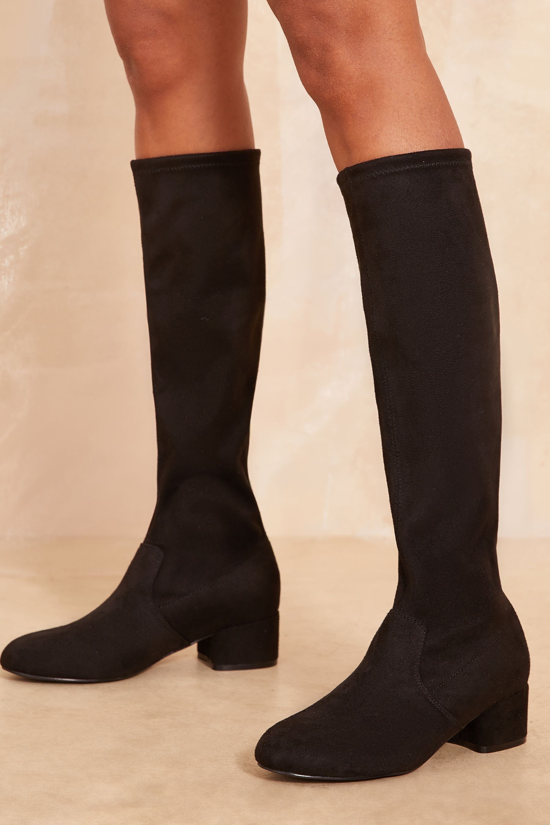 Buy Friends Like These Black Standard Fit Low Block Heel Knee Stretch Faux Suede Boots from the Next UK online shop