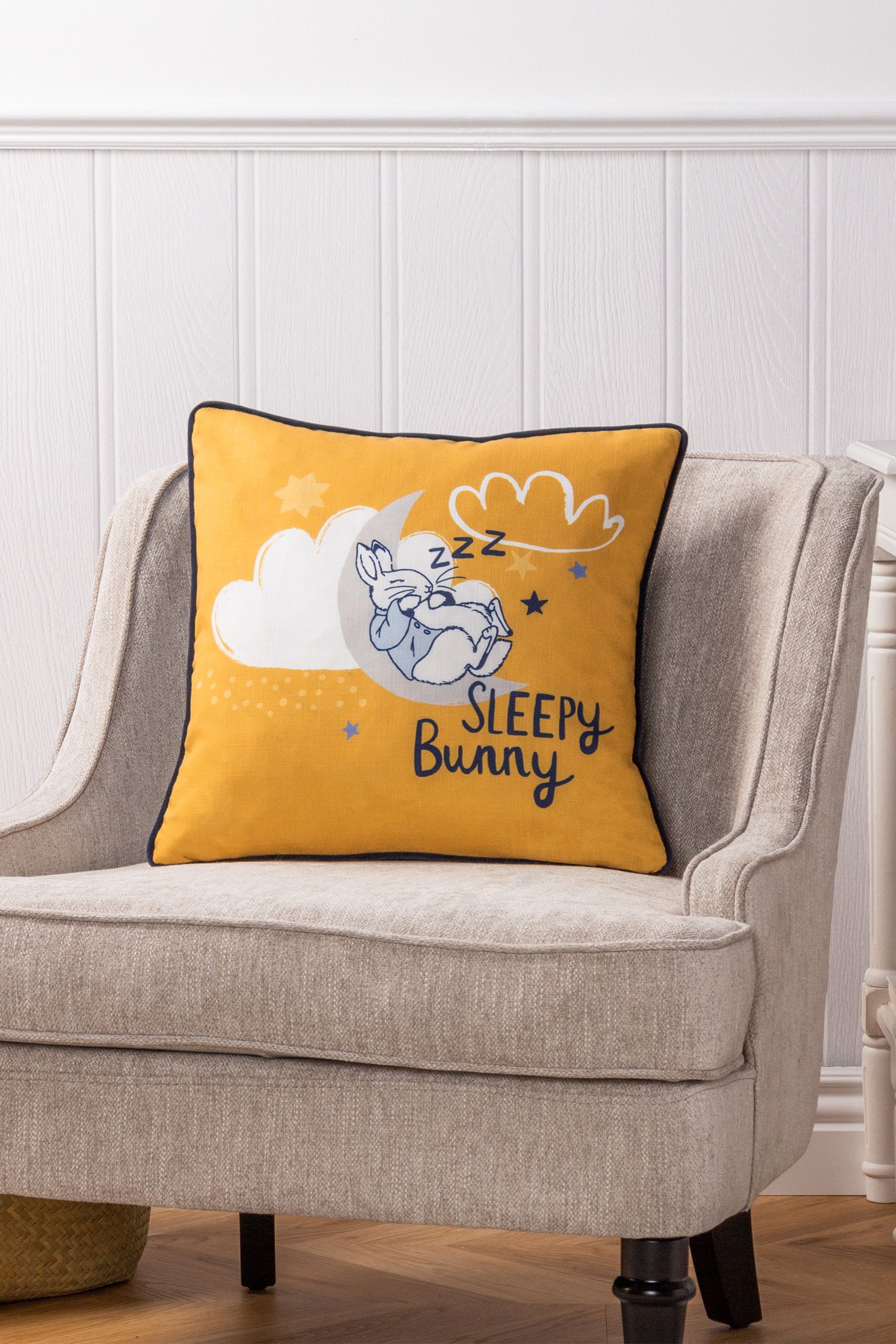 Buy Peter Rabbit Yellow Sleepy Head Timeless Cushion from the Next UK online shop