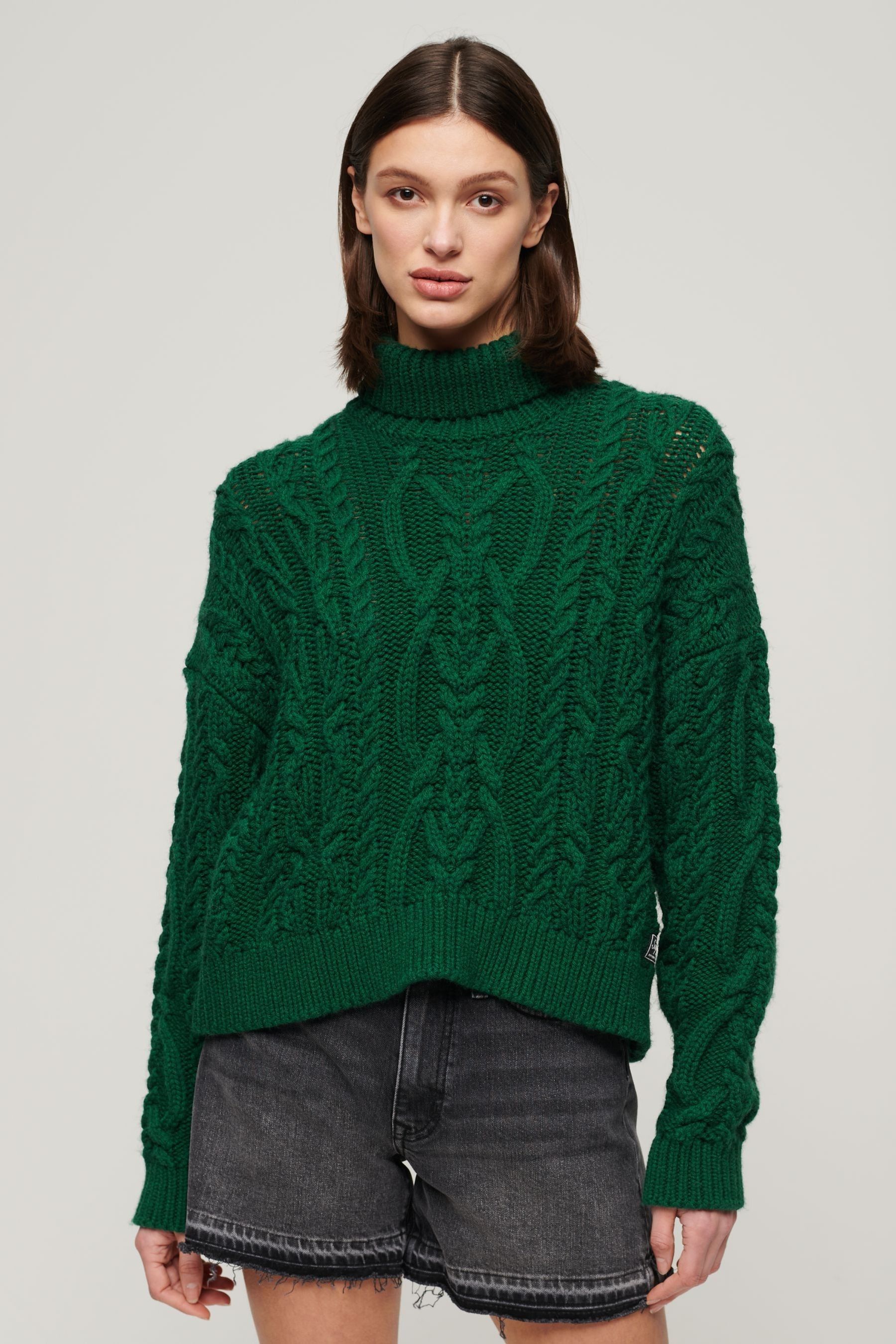 High neck cable knit jumper best sale