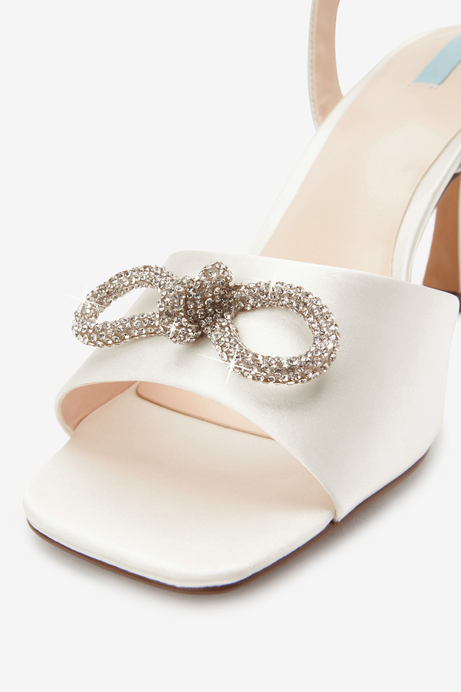 Sparkle bow sandals top