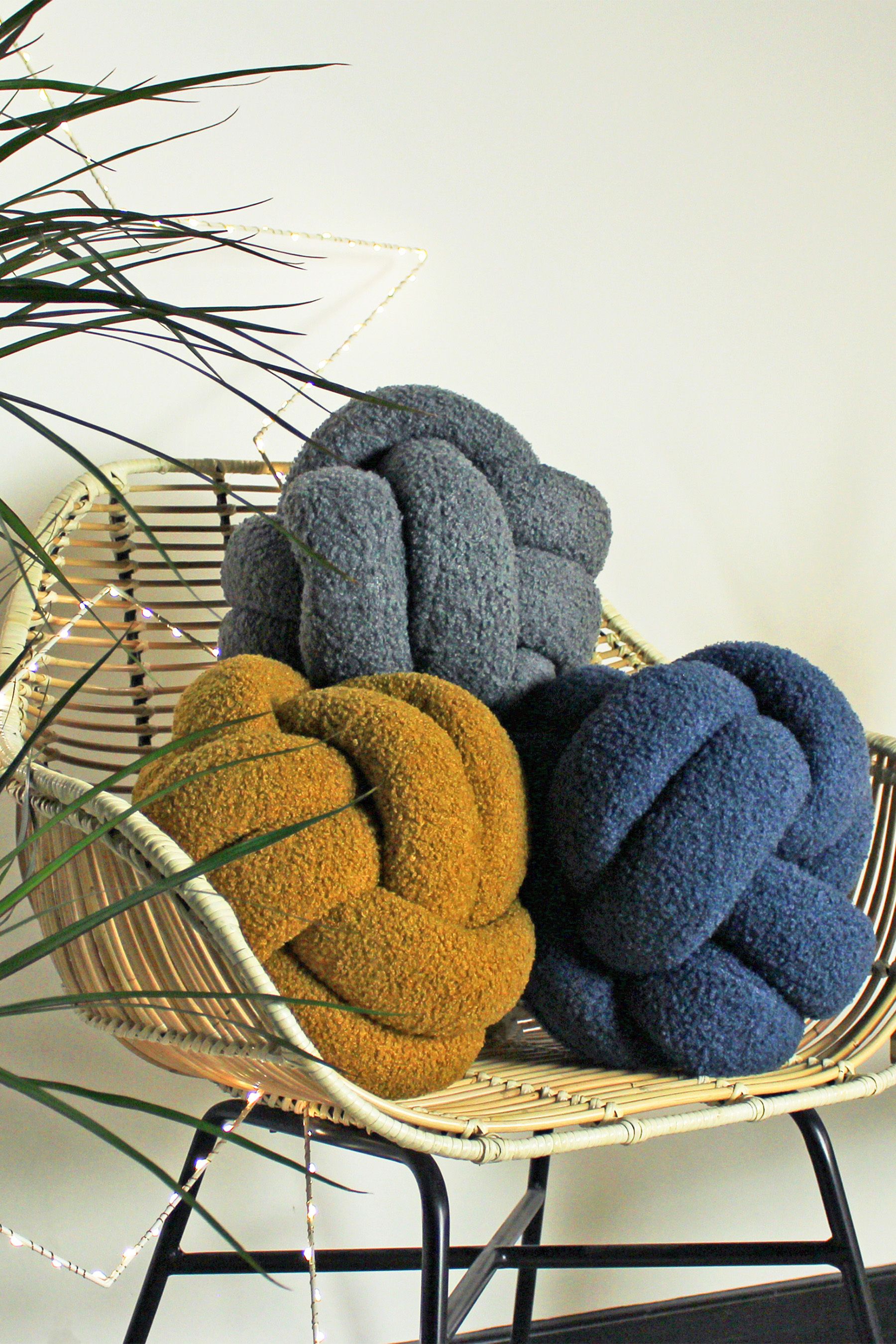 Buy furn. Yellow Boucle Knot Cushion from the Next UK online shop
