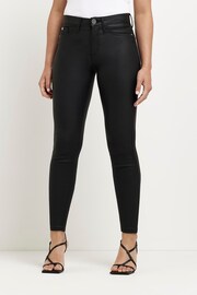 River Island Black Petite Mid Rise Coated Skinny Jeans - Image 1 of 5