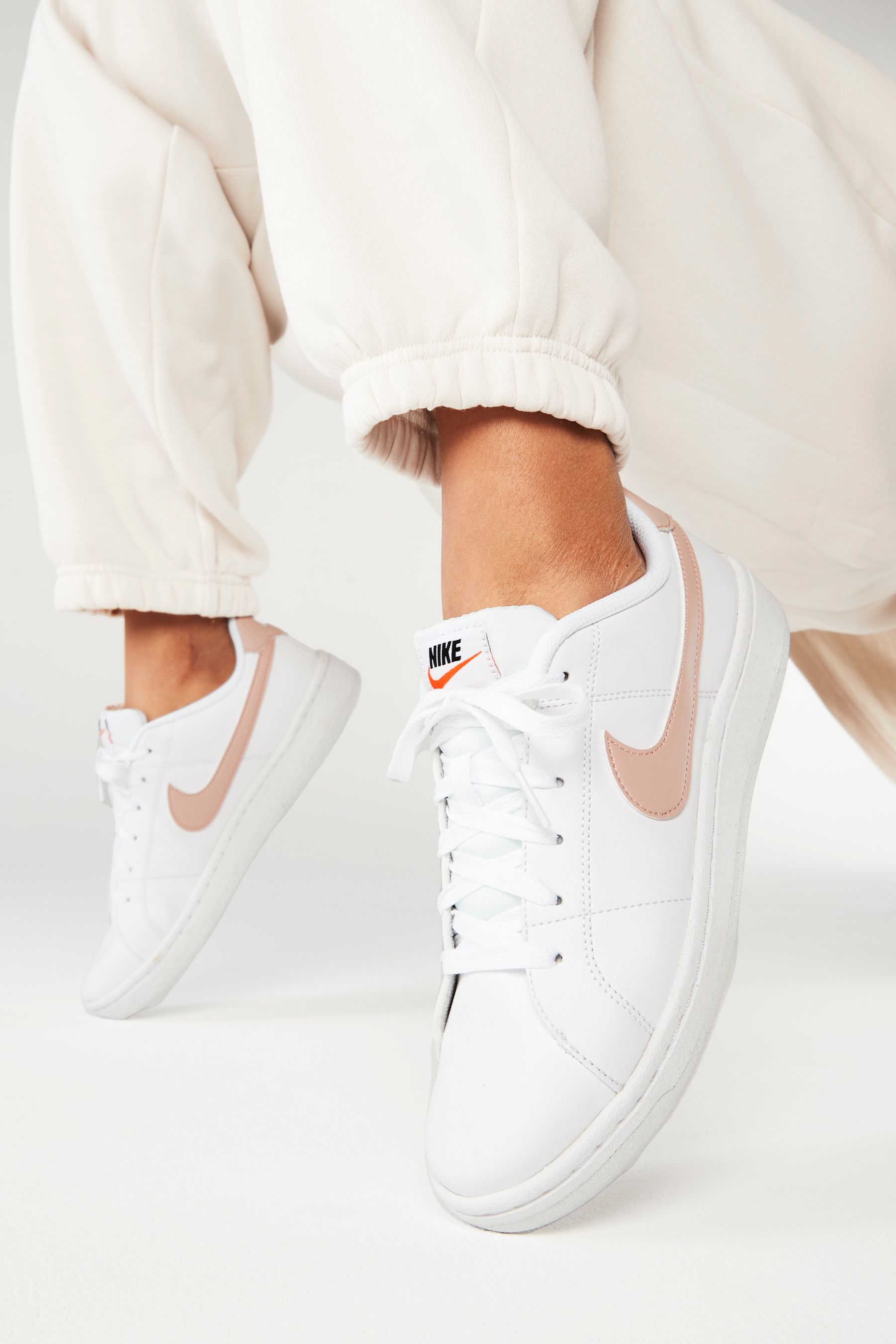 Buy Nike White Pink Court Legacy Trainers from Next Austria