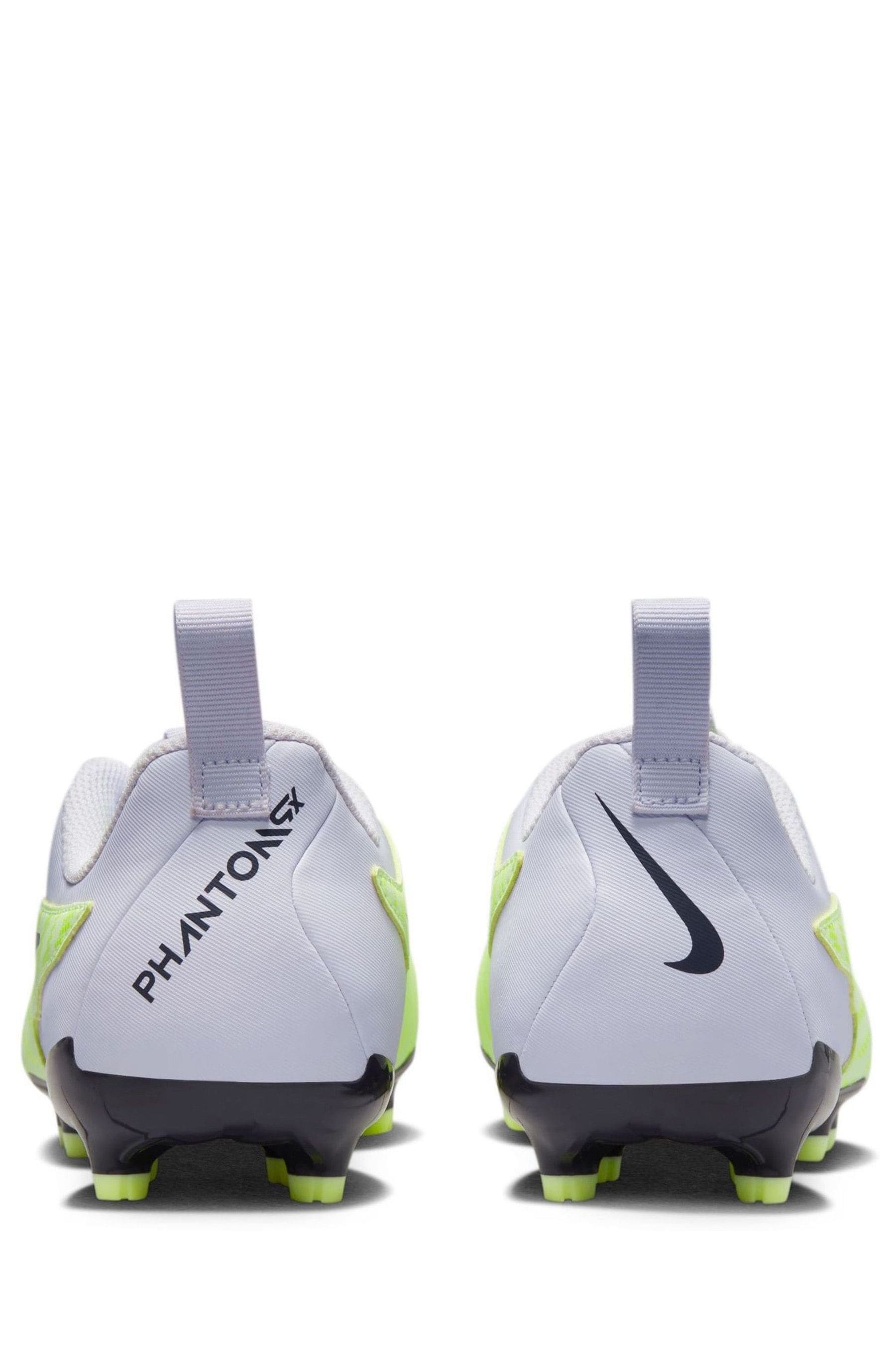 Buy Nike Yellow Jr. Phantom Academy Firm Ground Football Boots from Next Luxembourg