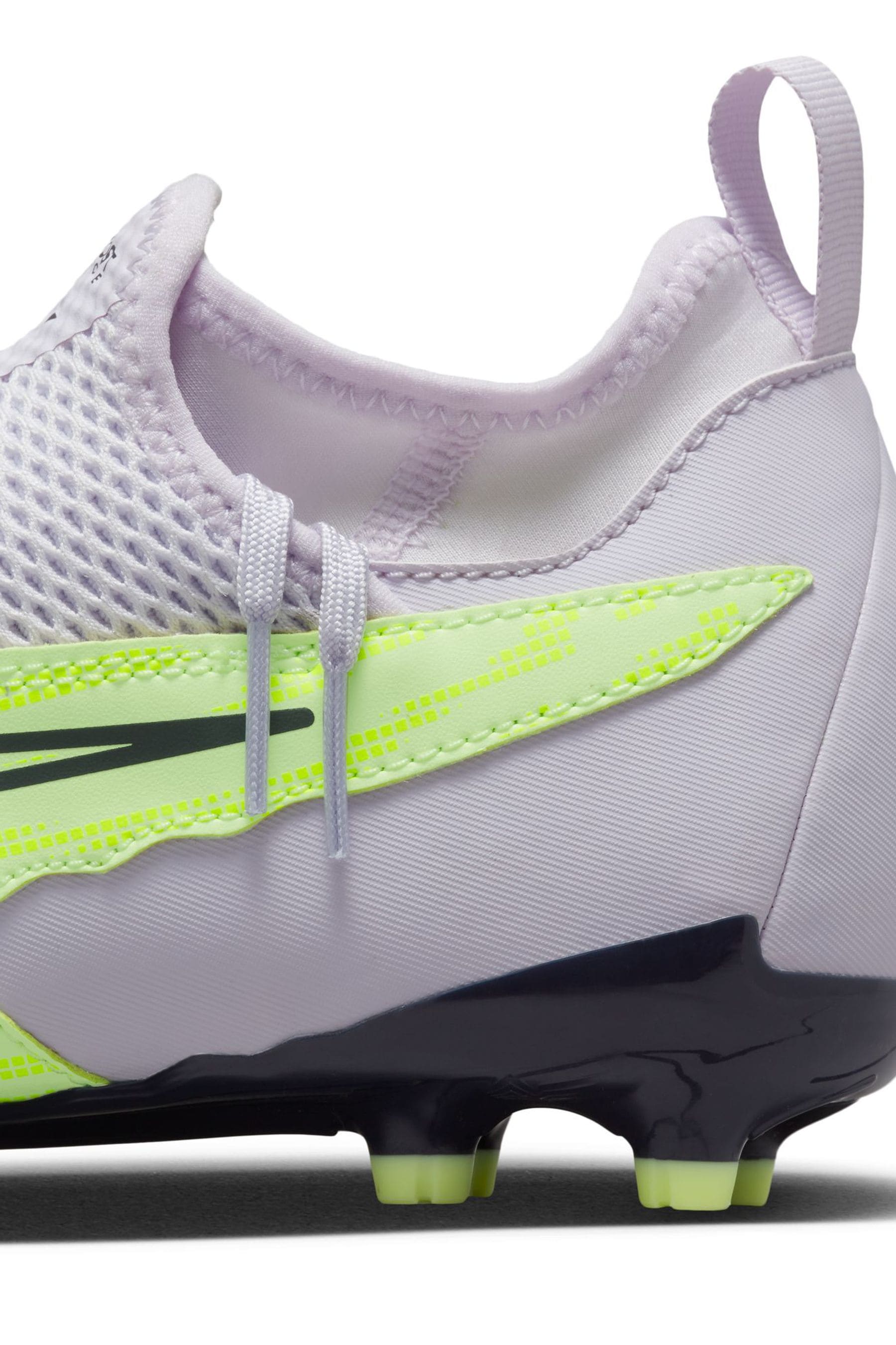 Grey and yellow nike boots top