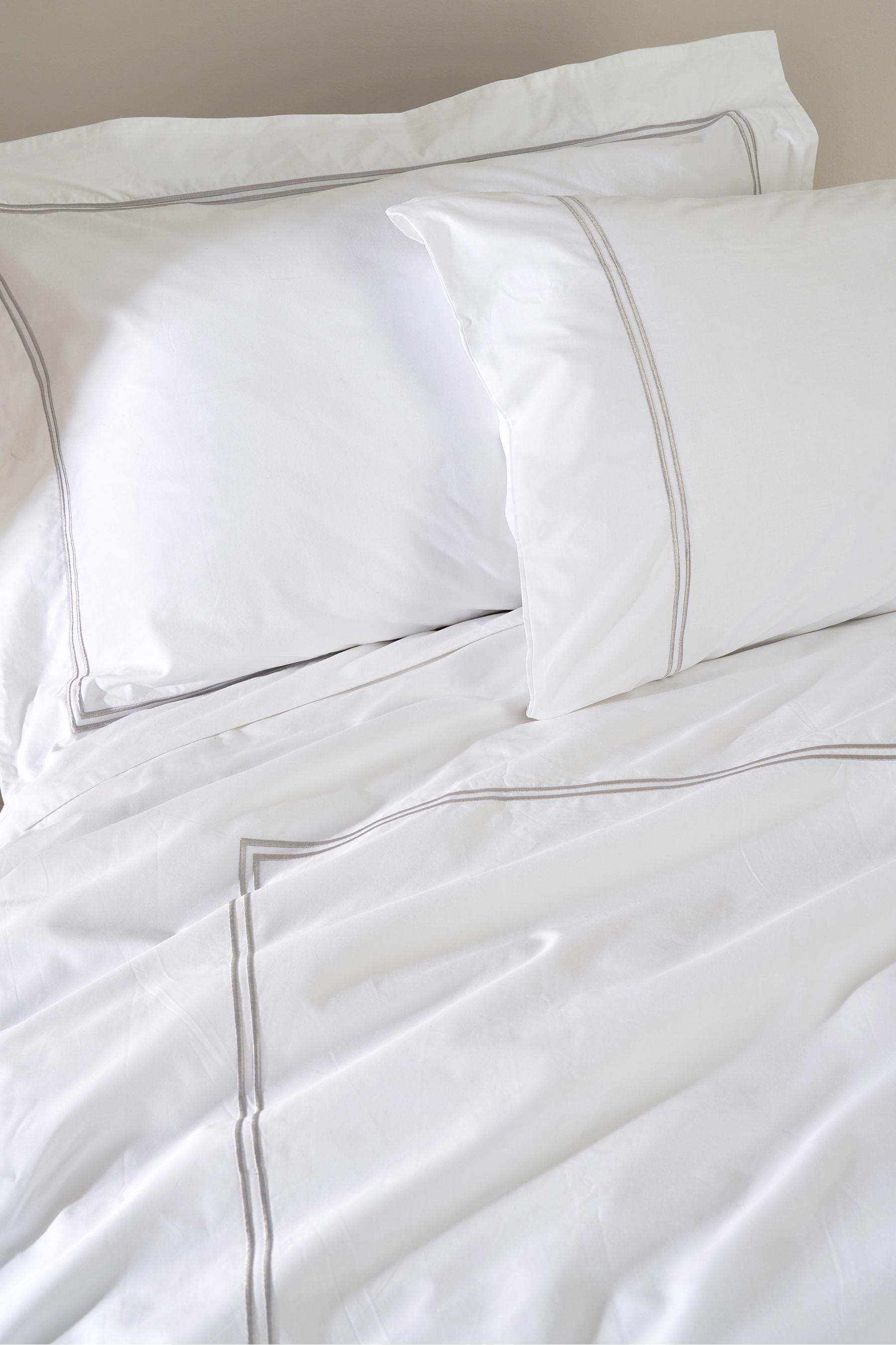 Buy Truly Set of 2 White Satin Stitch Oxford 100 Cotton Pillowcases from Next Luxembourg