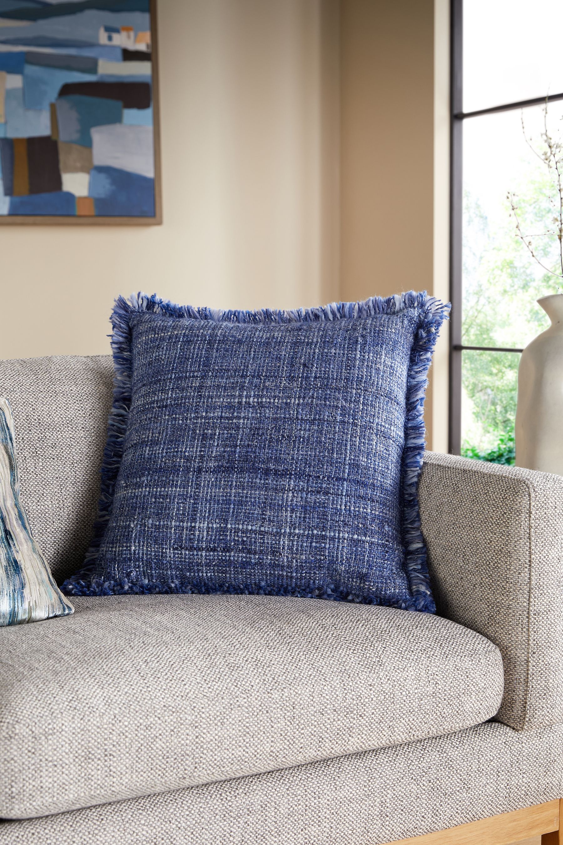 Buy Blue 50 x 50cm Harlston Textured Fringe Cushion from Next Luxembourg