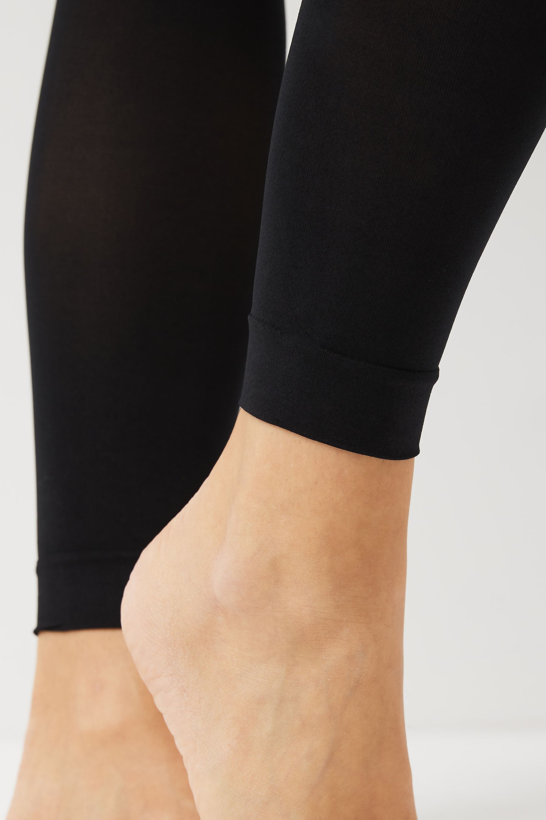 Buy Black 40 Denier Footless Opaque Tights from the Next UK online shop