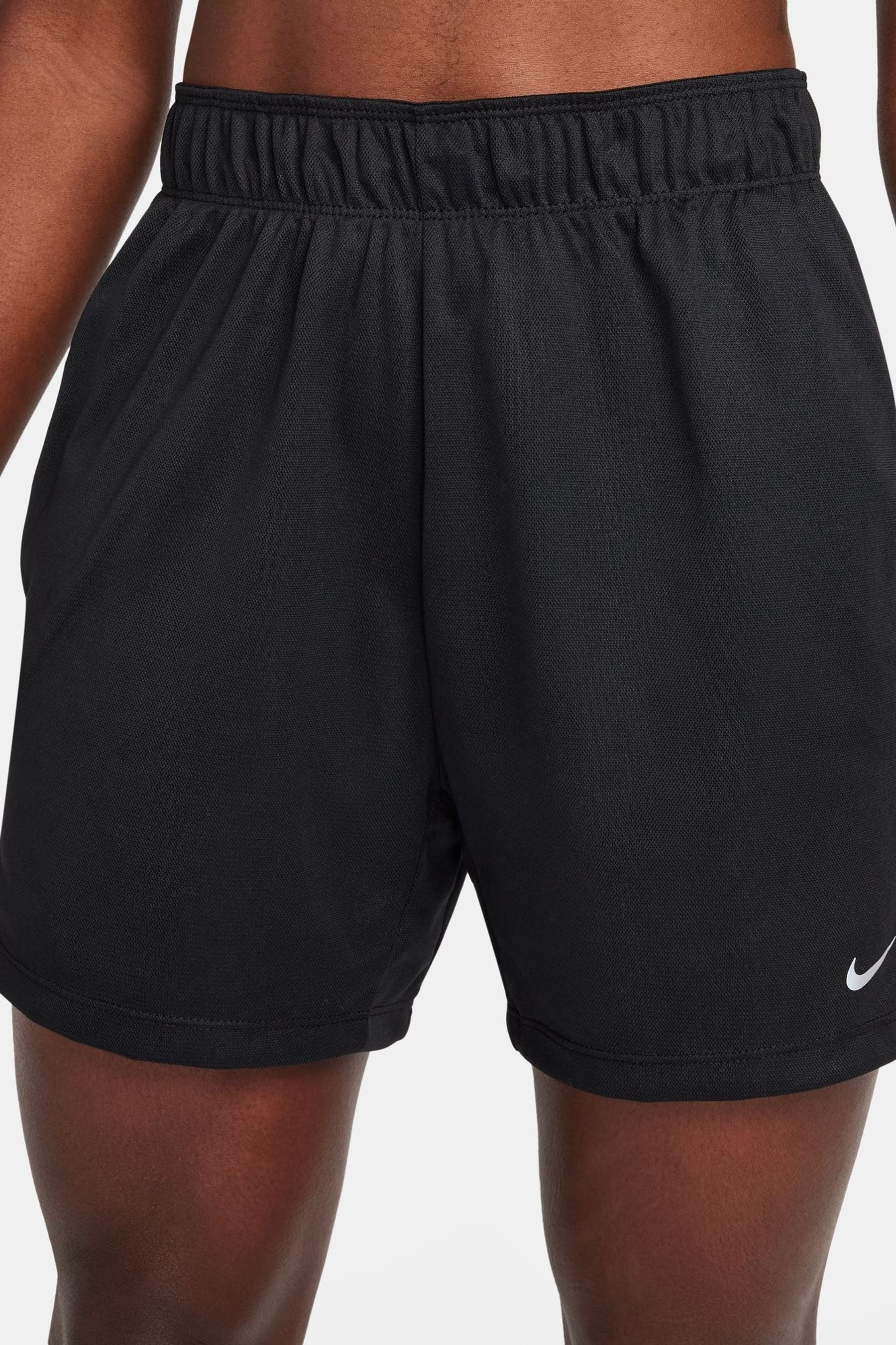 Buy Nike Black Dri FIT Attack Fitness Mid Rise 5 Unlined Shorts from the Next UK online shop