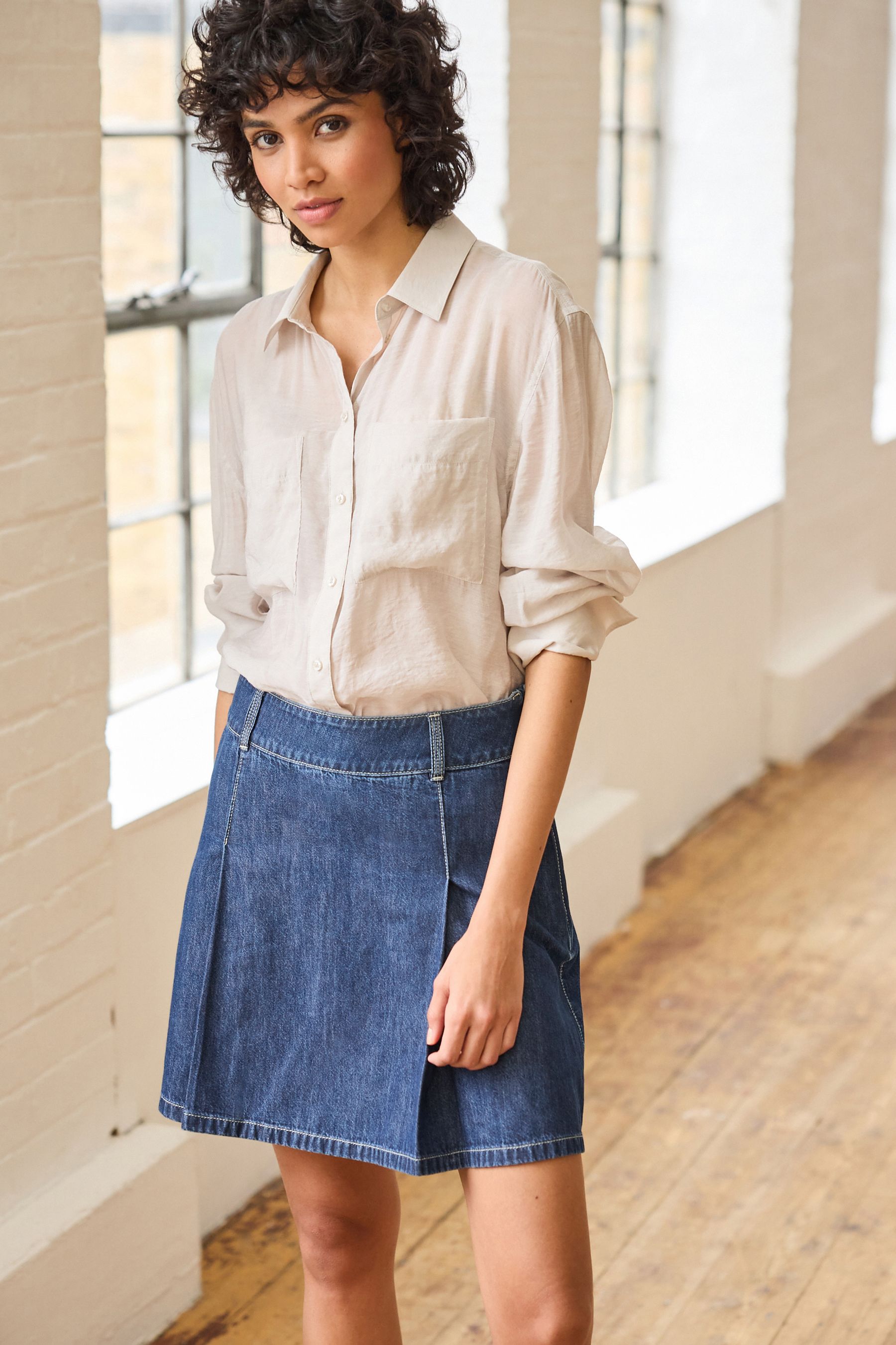 Buy Rinse Blue Pleated Denim Mini Skirt from Next Luxembourg