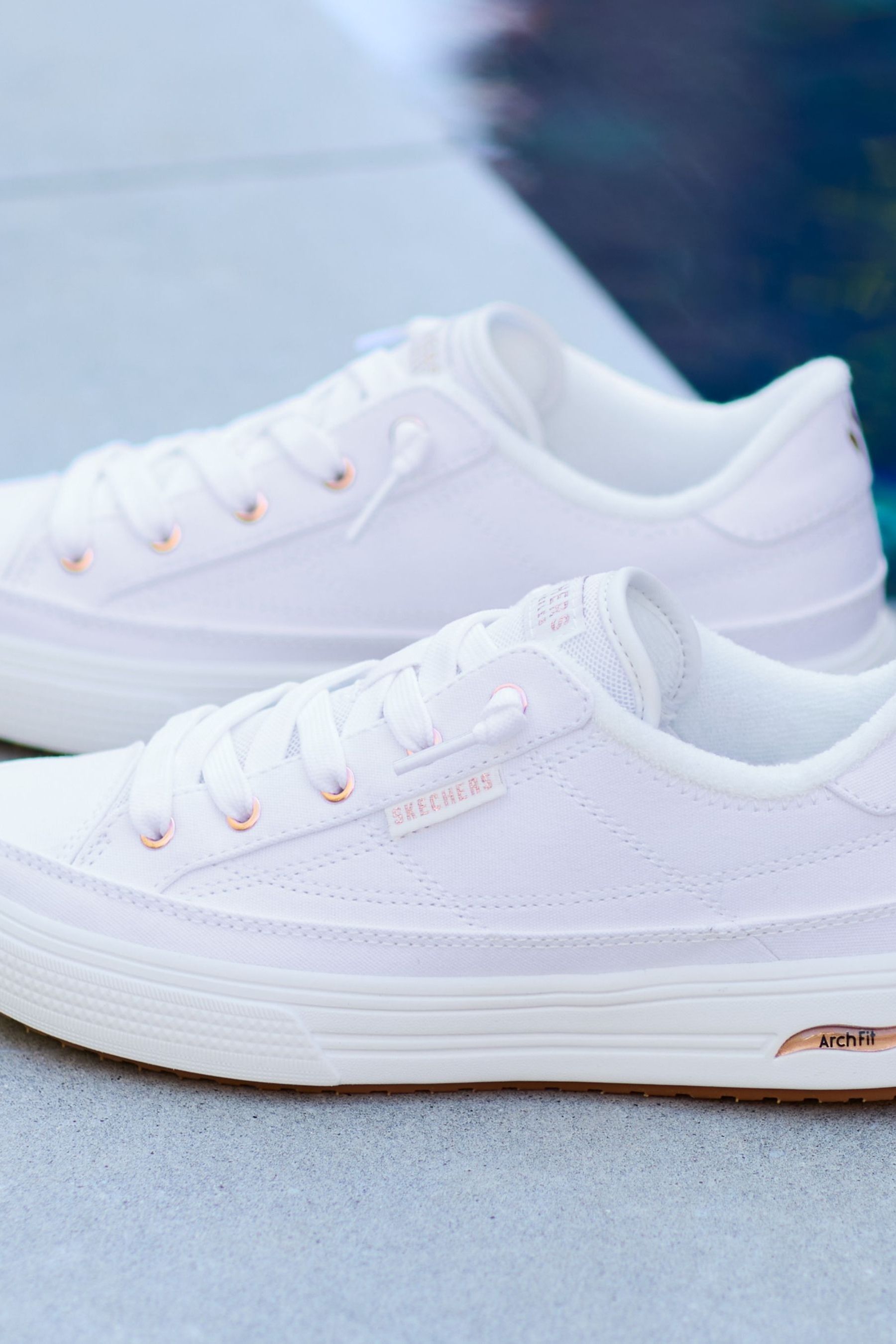 Womens white skechers trainers 2025