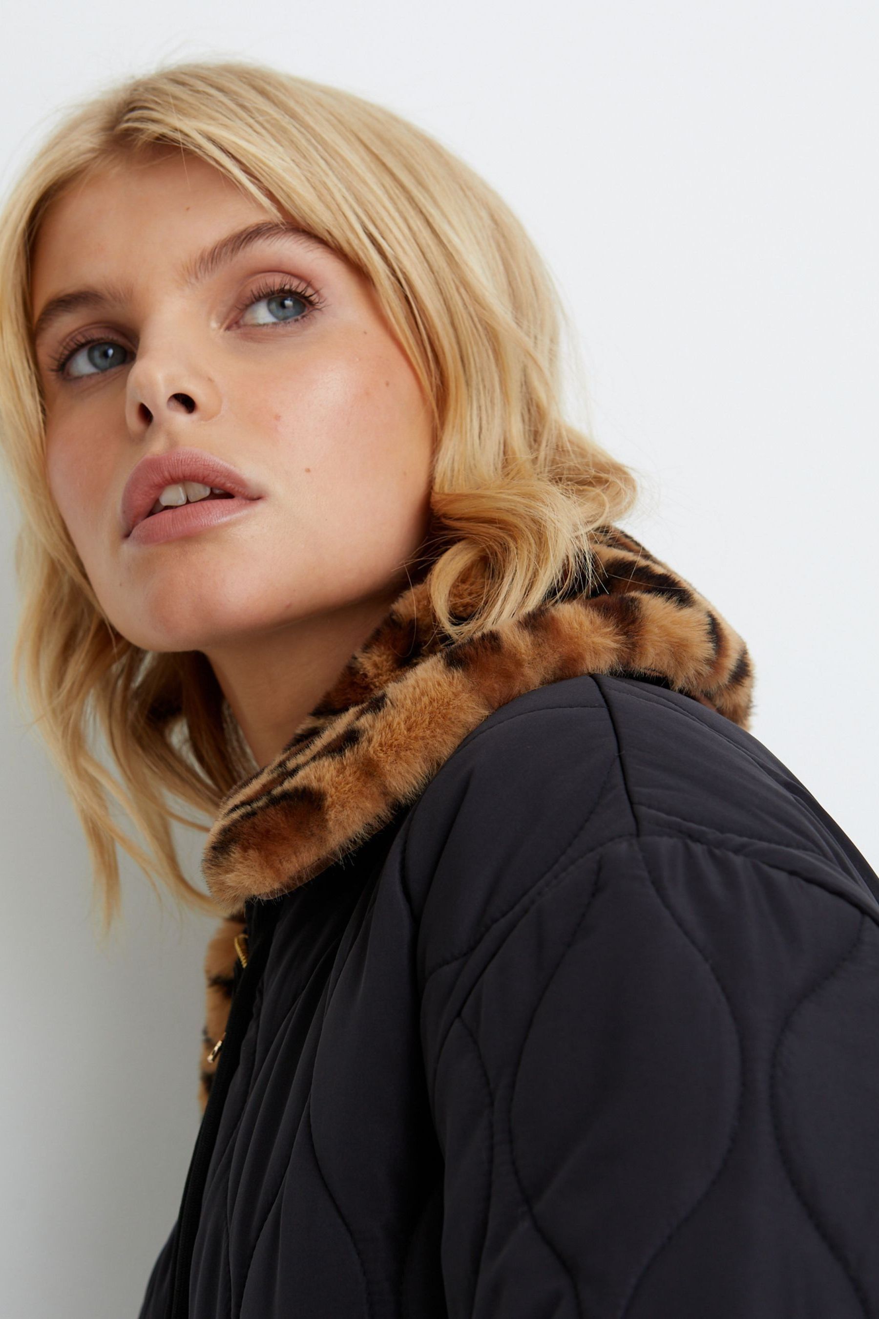 Buy Oliver Bonas Animal Print Faux Fur Collar Black Quilted Jacket from Next Latvia