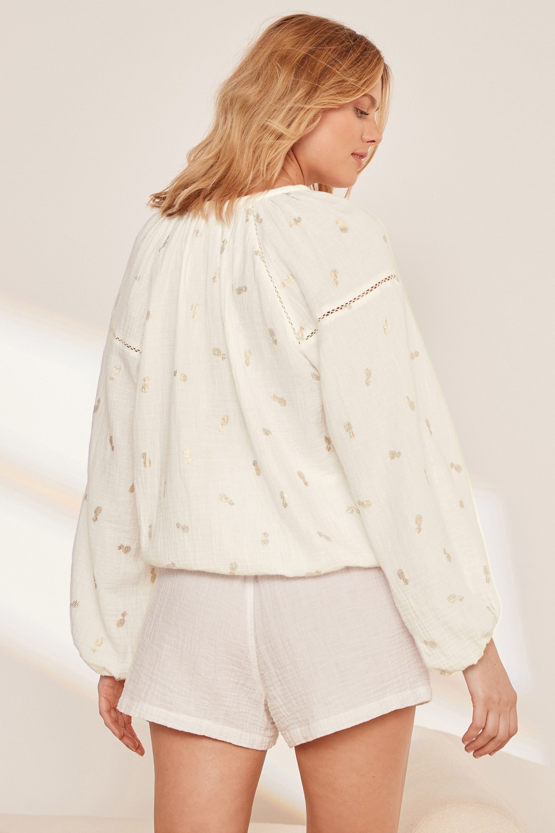 Cream bubble hem top on sale