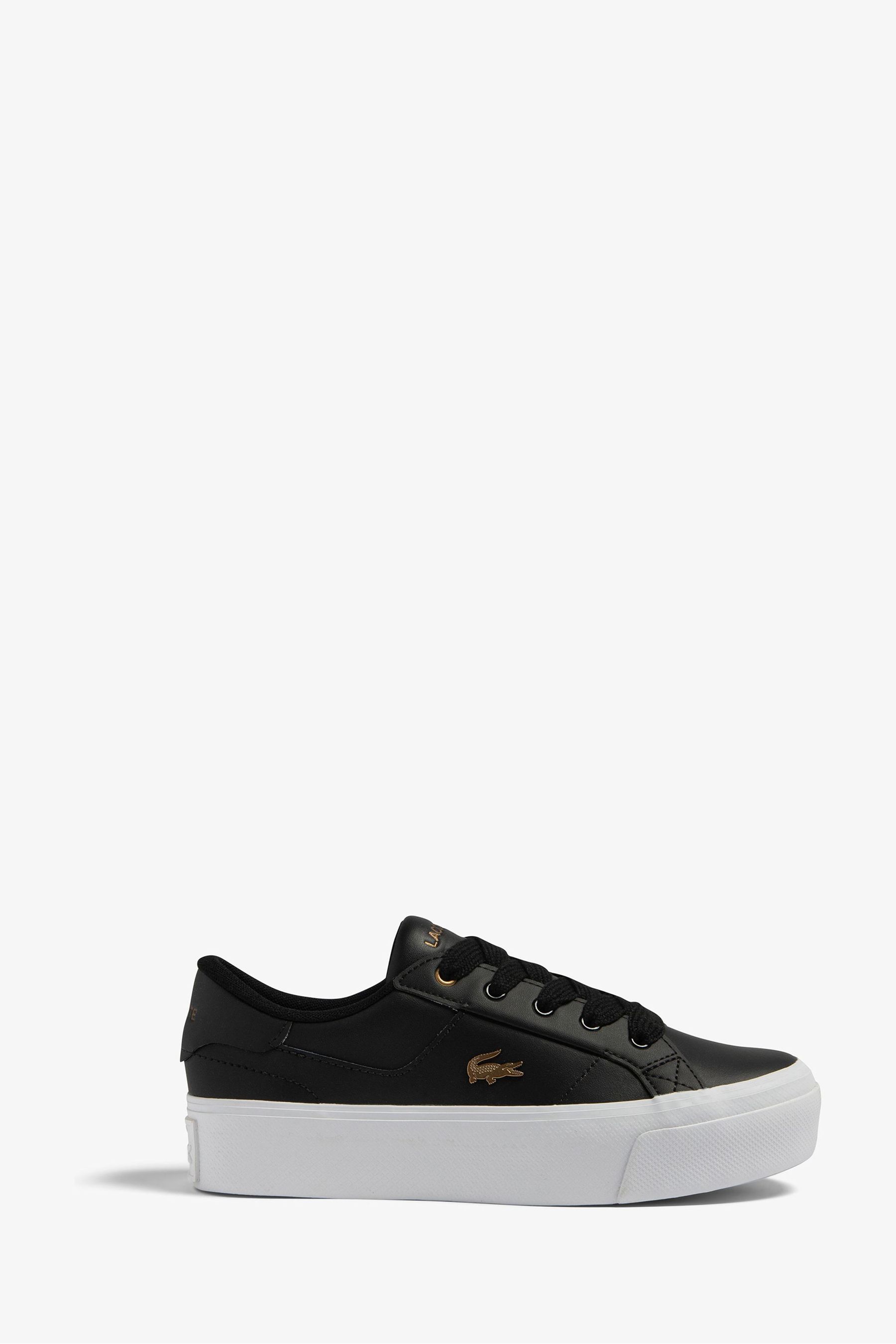 Ladies black and white trainers top