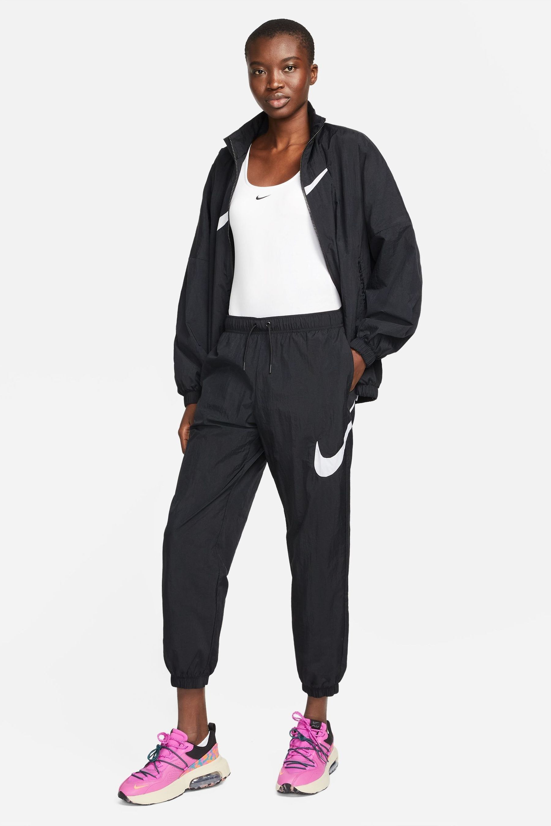 Buy Nike Black Club Woven Joggers from Next Luxembourg