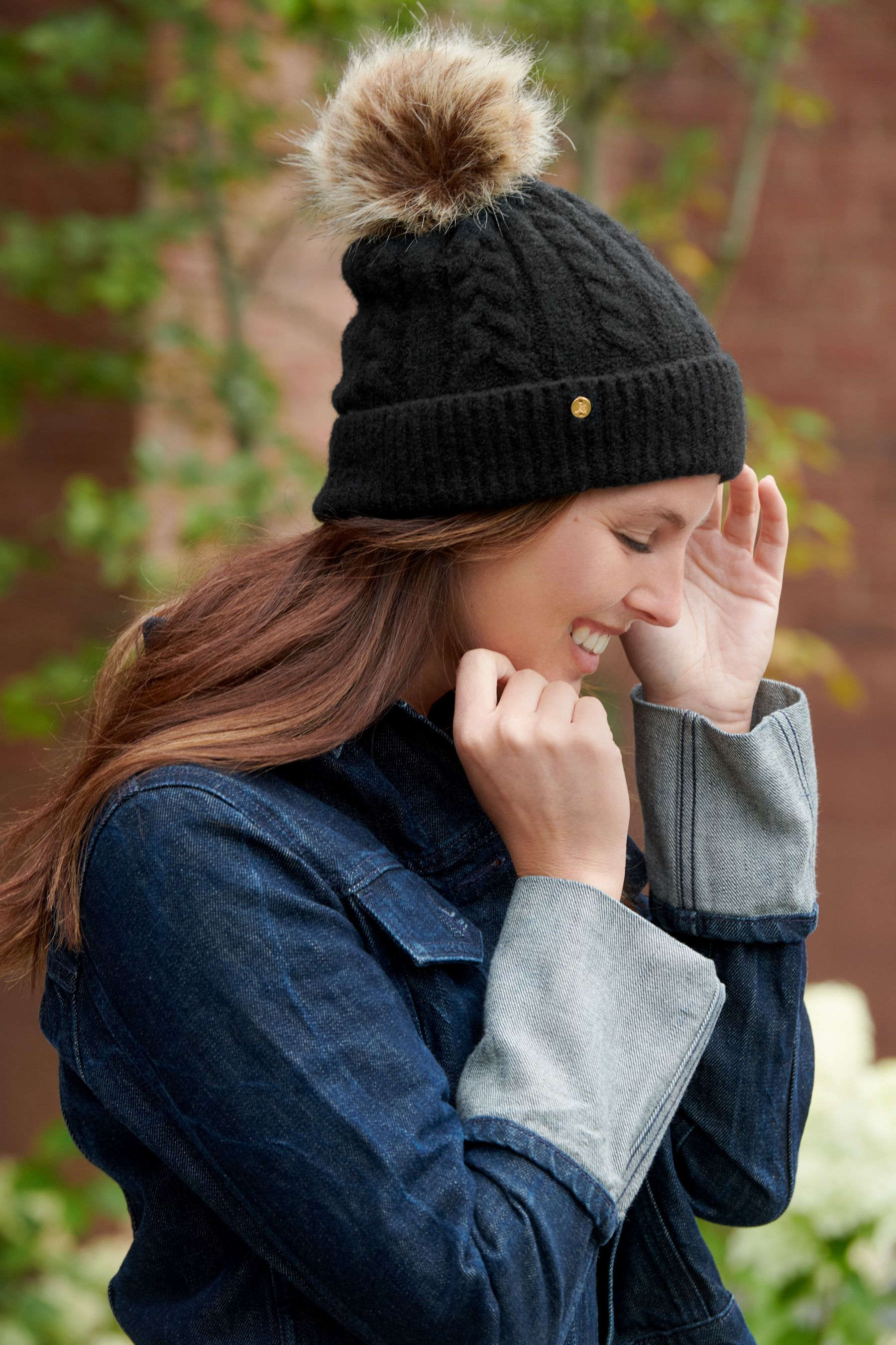 Black hat brown pom pom discount