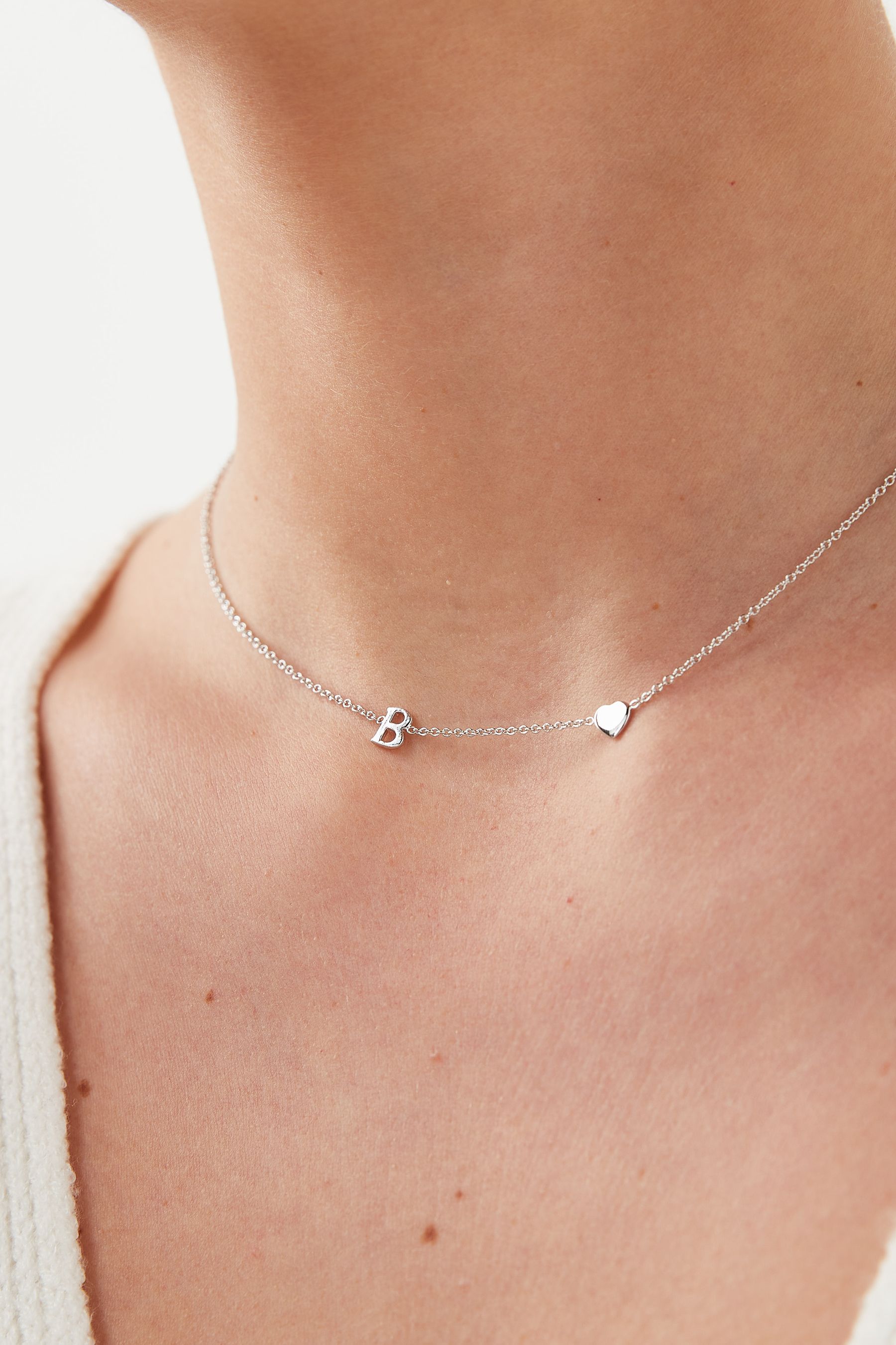 Buy Sterling Silver Asymmetric Initial Heart Necklace from Next Luxembourg
