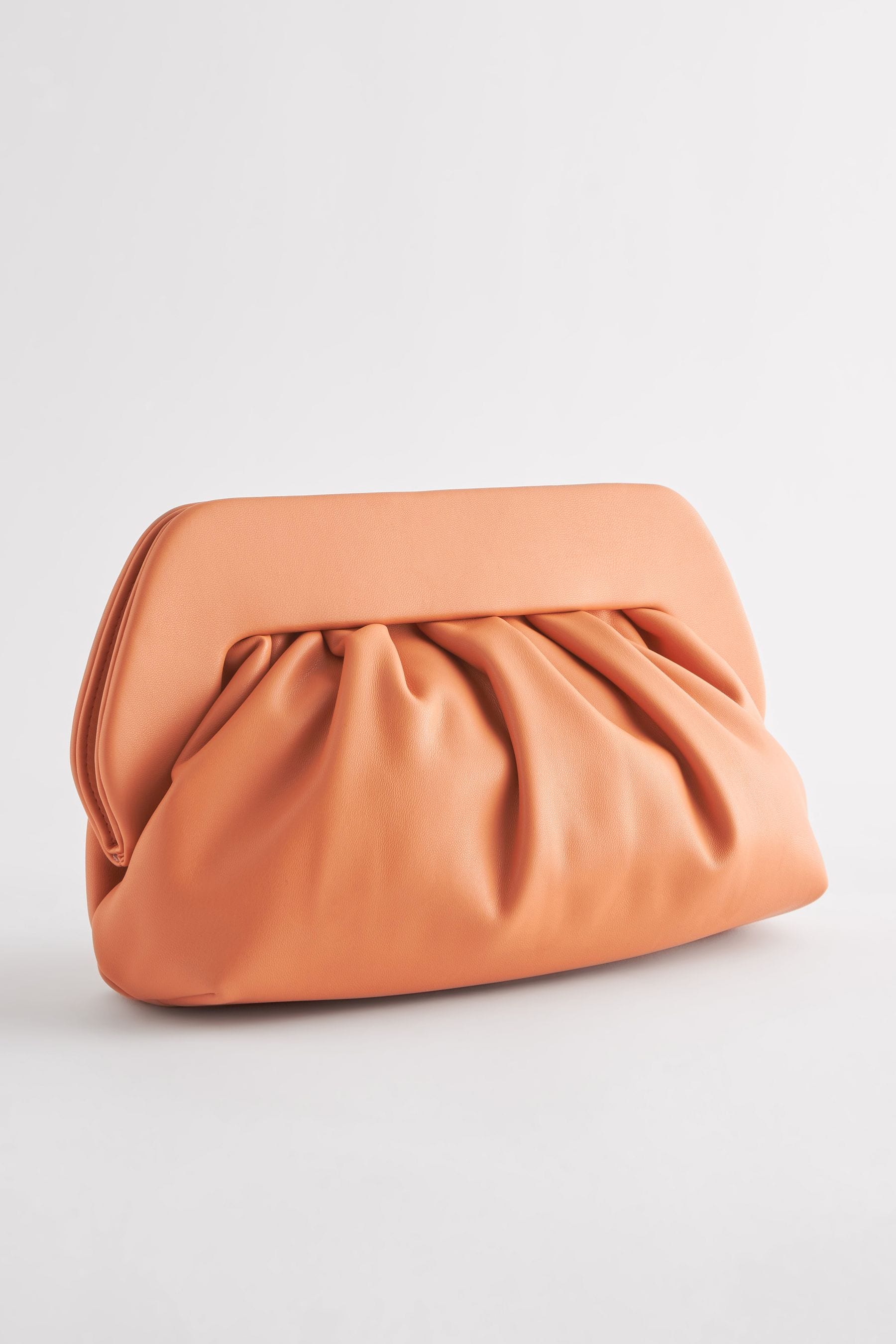 Coral pink clutch bag online