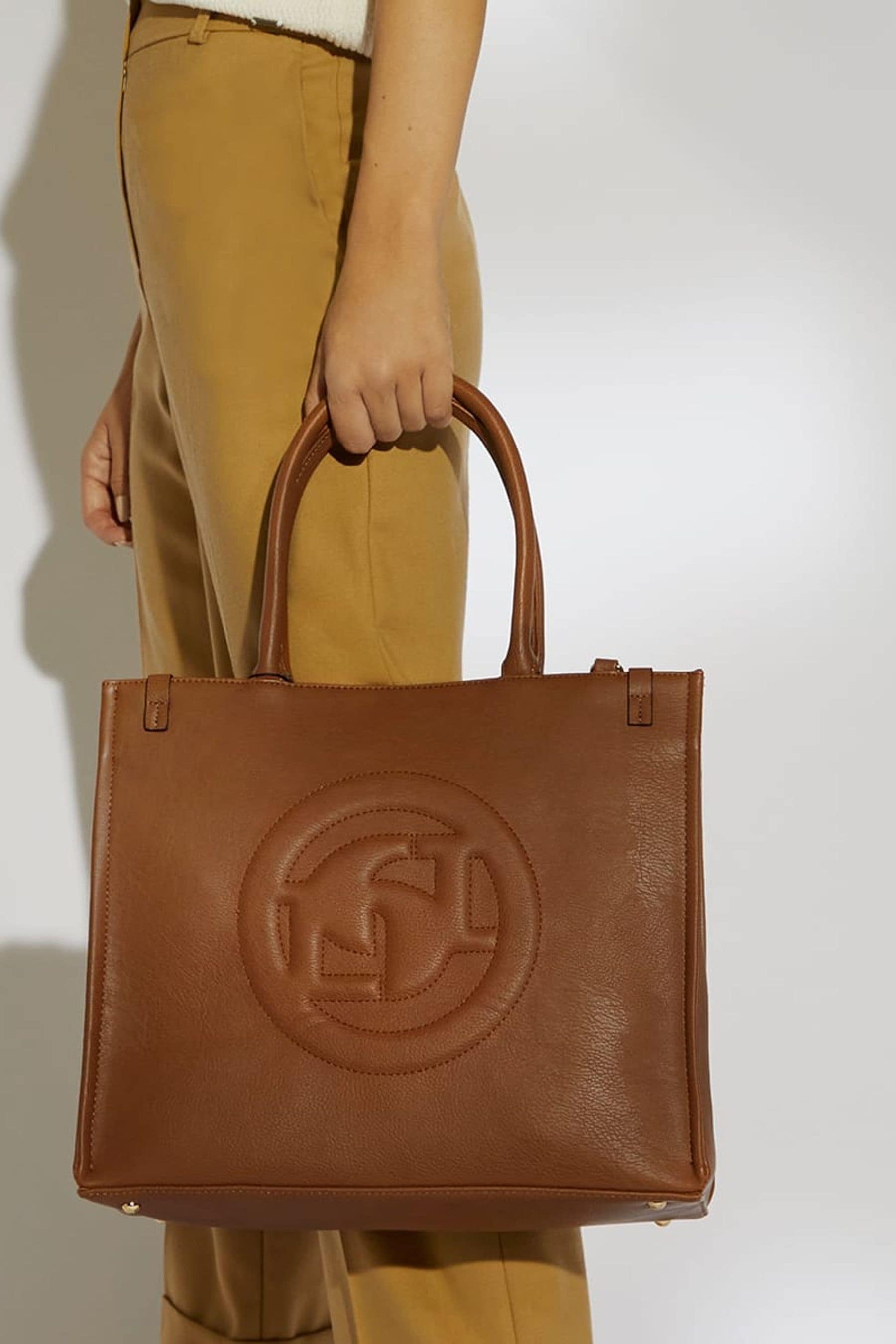 Buy Dune London Brown Large Monogram Dexter Bag from Next Ireland