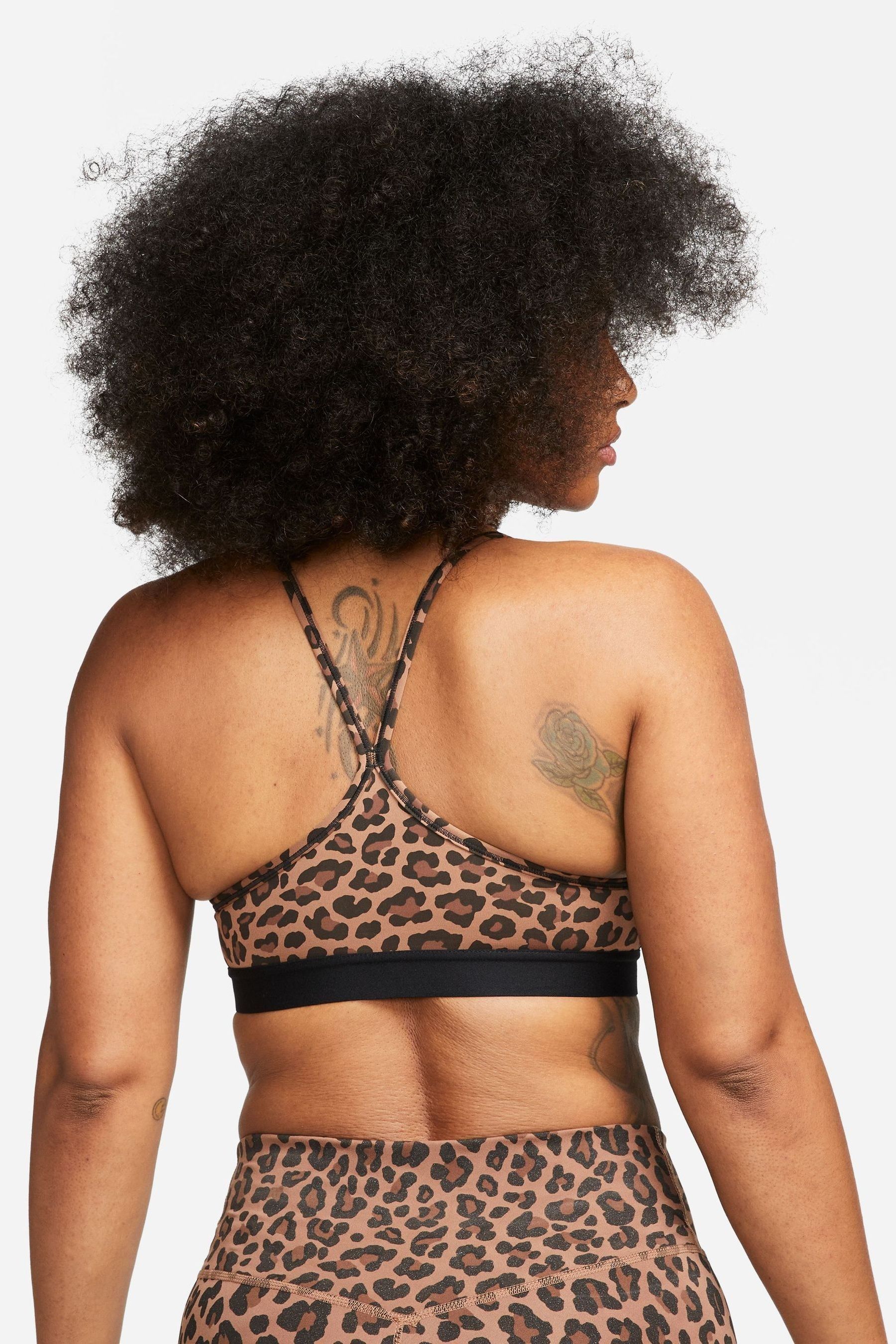 Buy Nike Brown Dri FIT Indy Light Support V Neck Leopard Print Bra from Next Lithuania