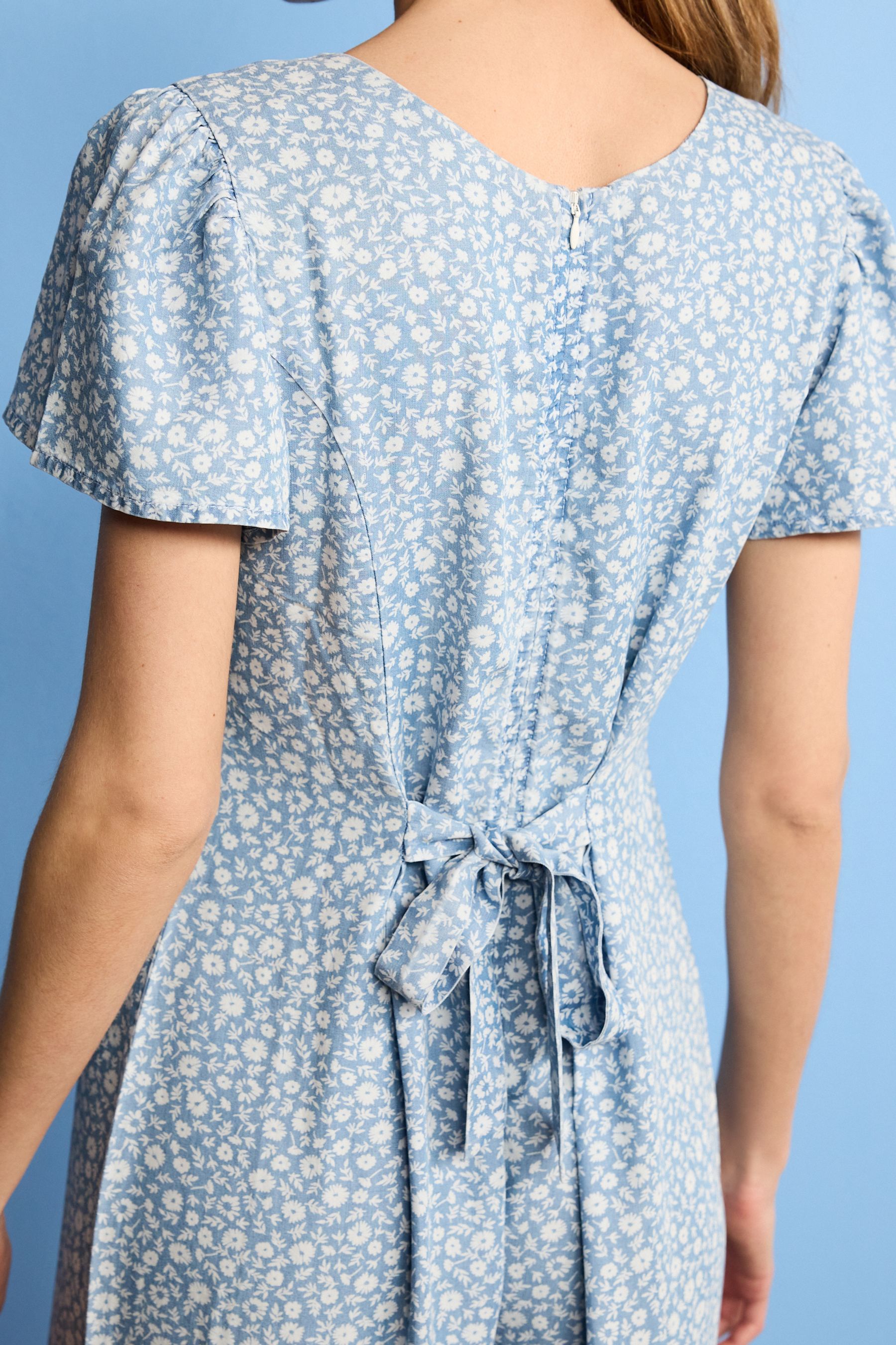 Buy Blue Ditsy Floral Print TENCEL Tie Back Cropped Jumpsuit from Next Luxembourg