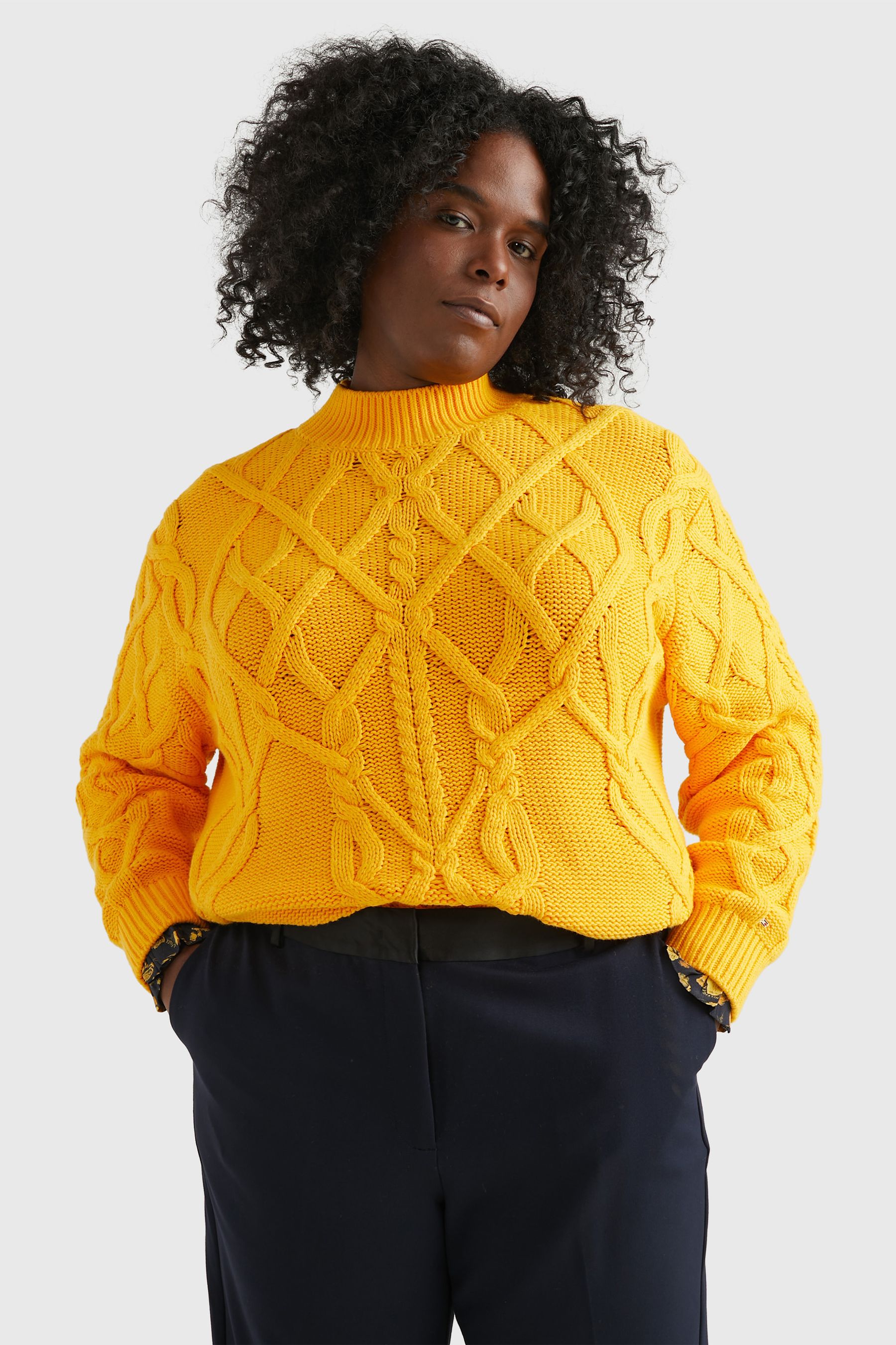 Buy Tommy Hilfiger Curve Yellow Relaxed Cable Knit Jumper from Next Luxembourg