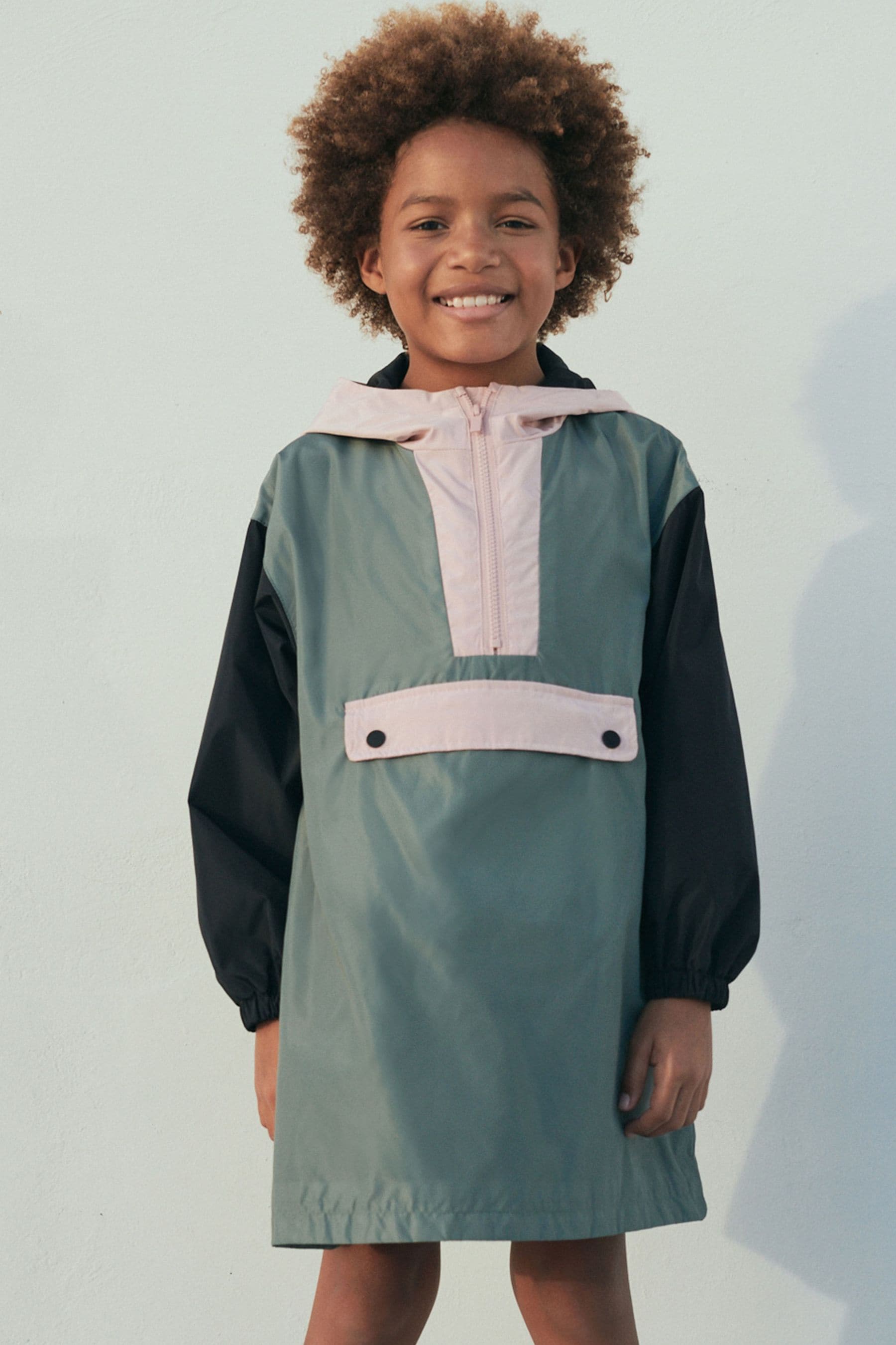 Buy Pink Green Shower Resistant Overhead Pack Away Poncho Cagoule 3 16yrs from Next Slovenia