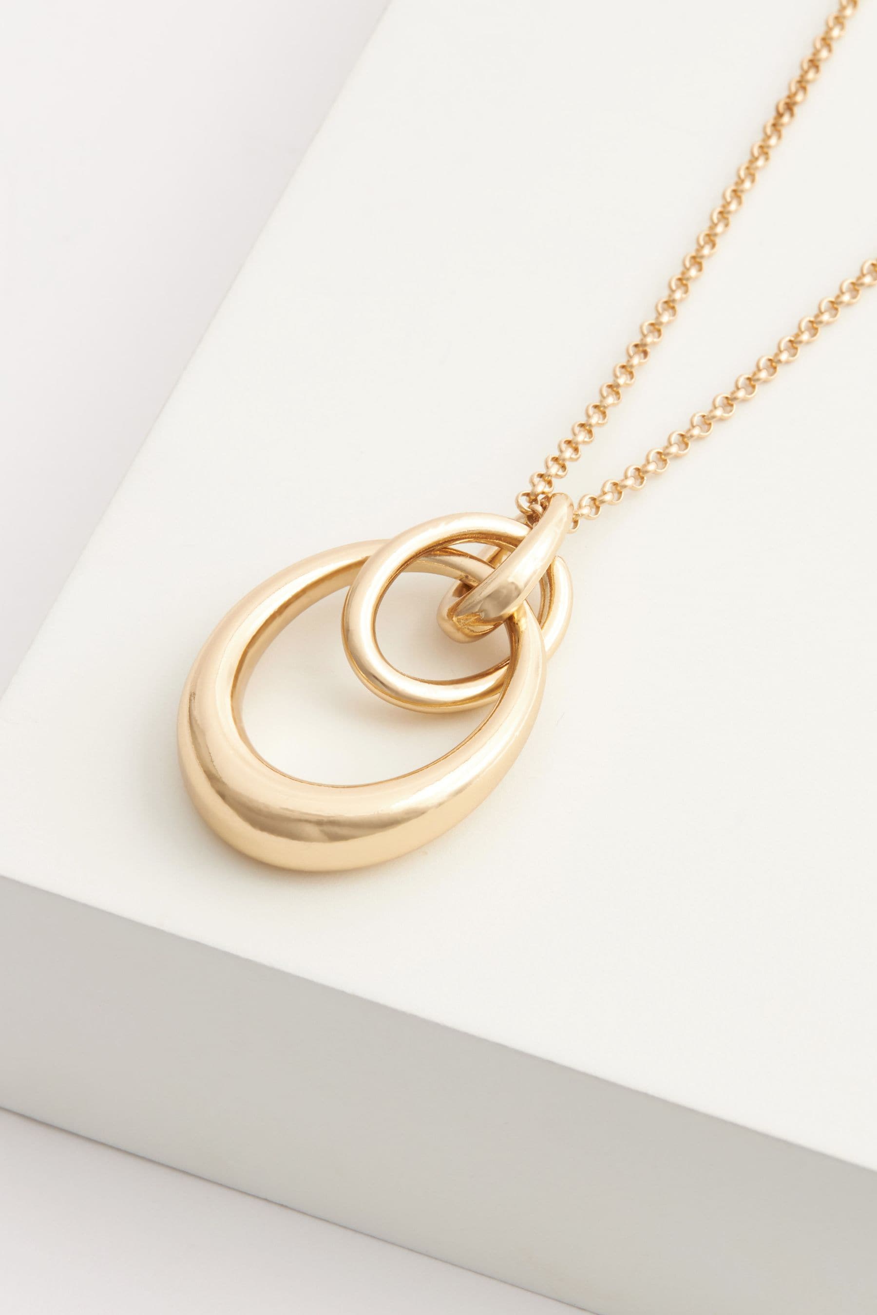Buy Gold Tone Interlocking Circle Pendant Necklace from Next Luxembourg
