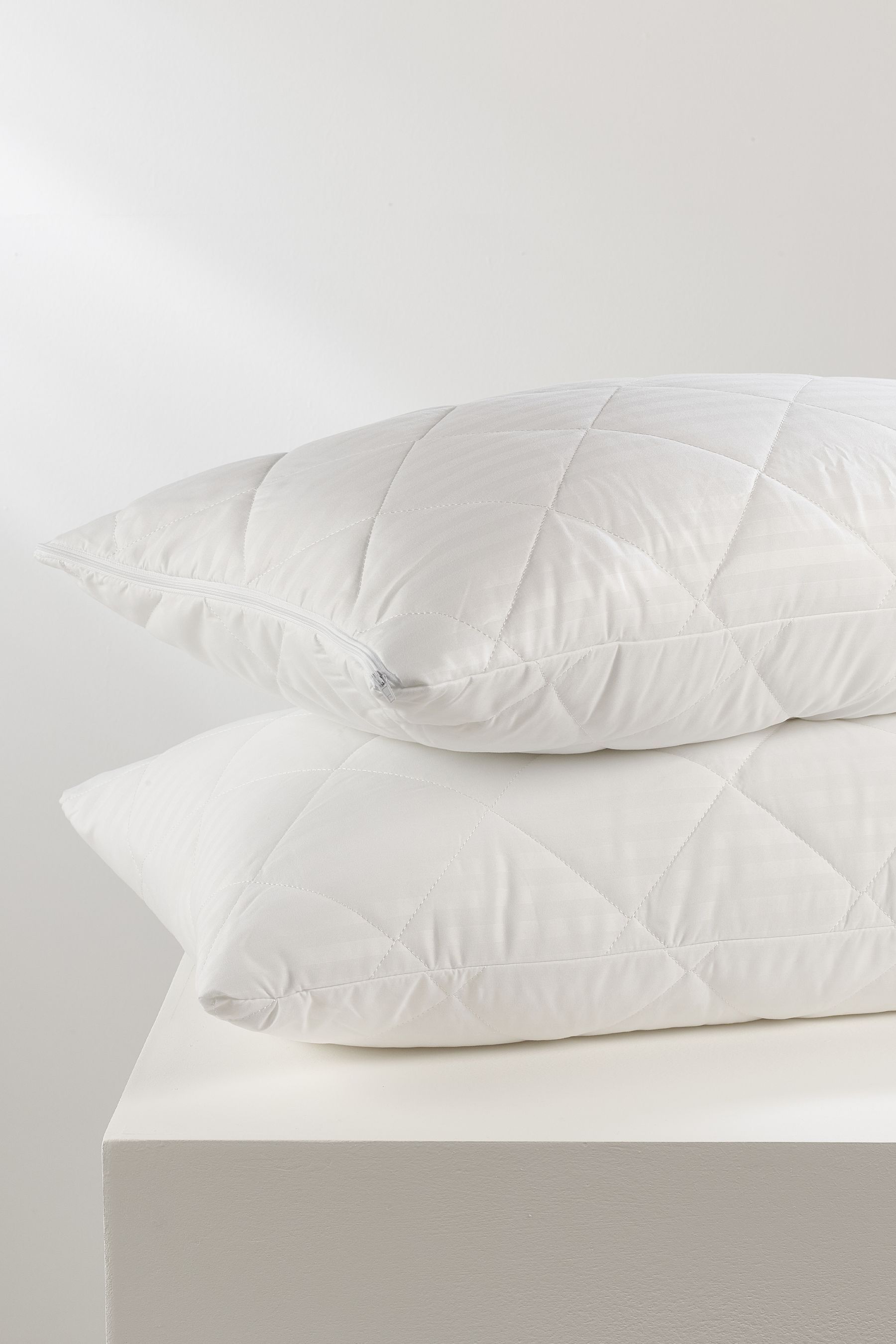 Snuggledown pillow protector store