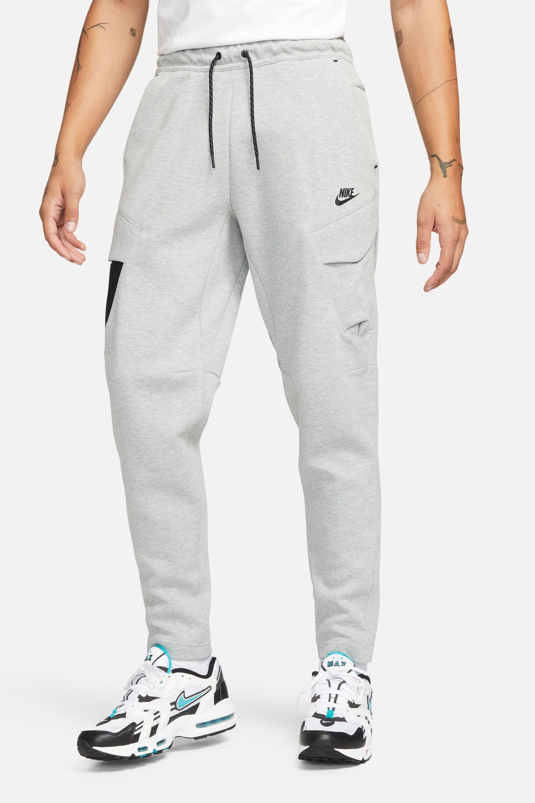 Nike grey tech joggers hotsell
