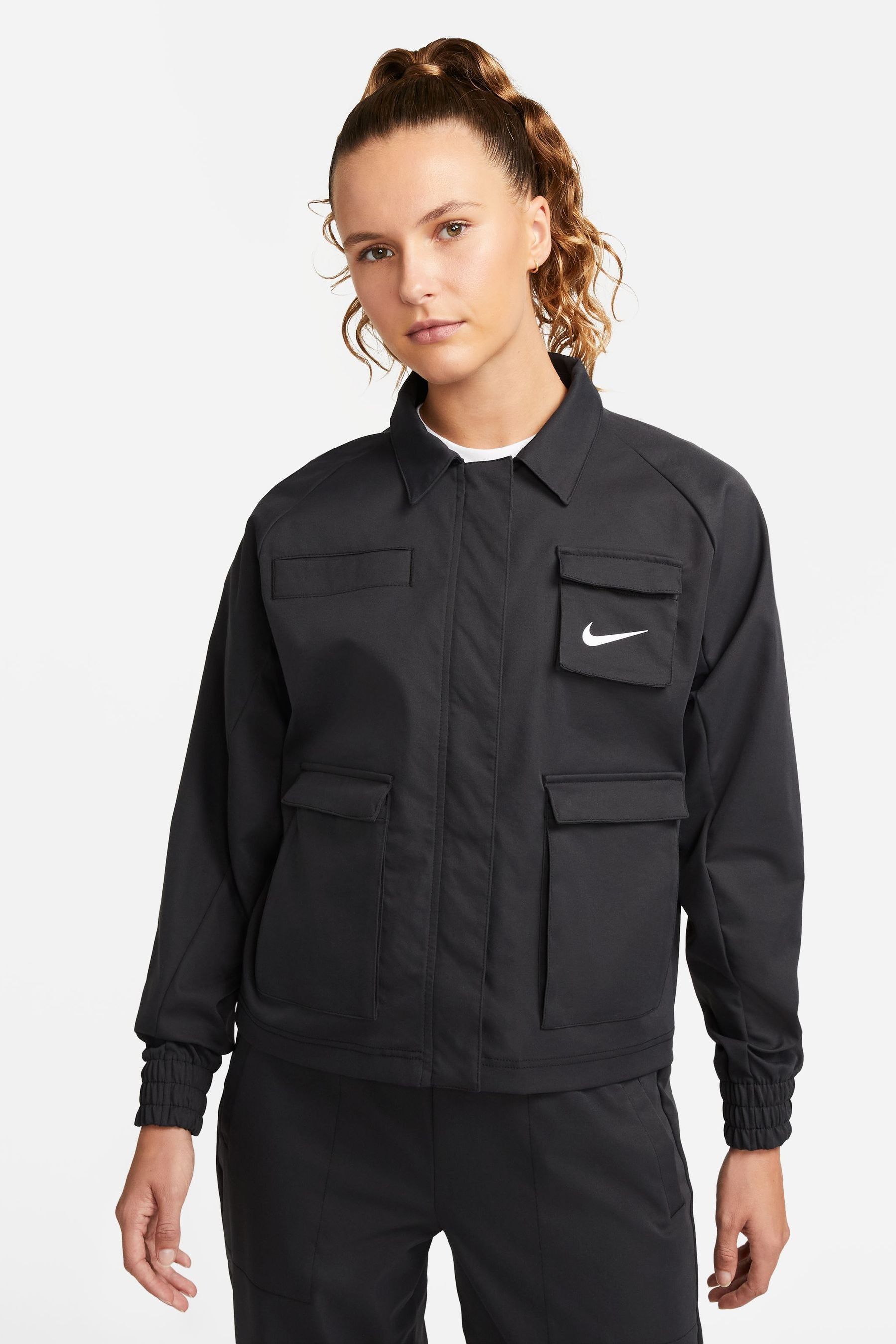 Buy Nike Black Swoosh Woven Jacket from Next Ireland
