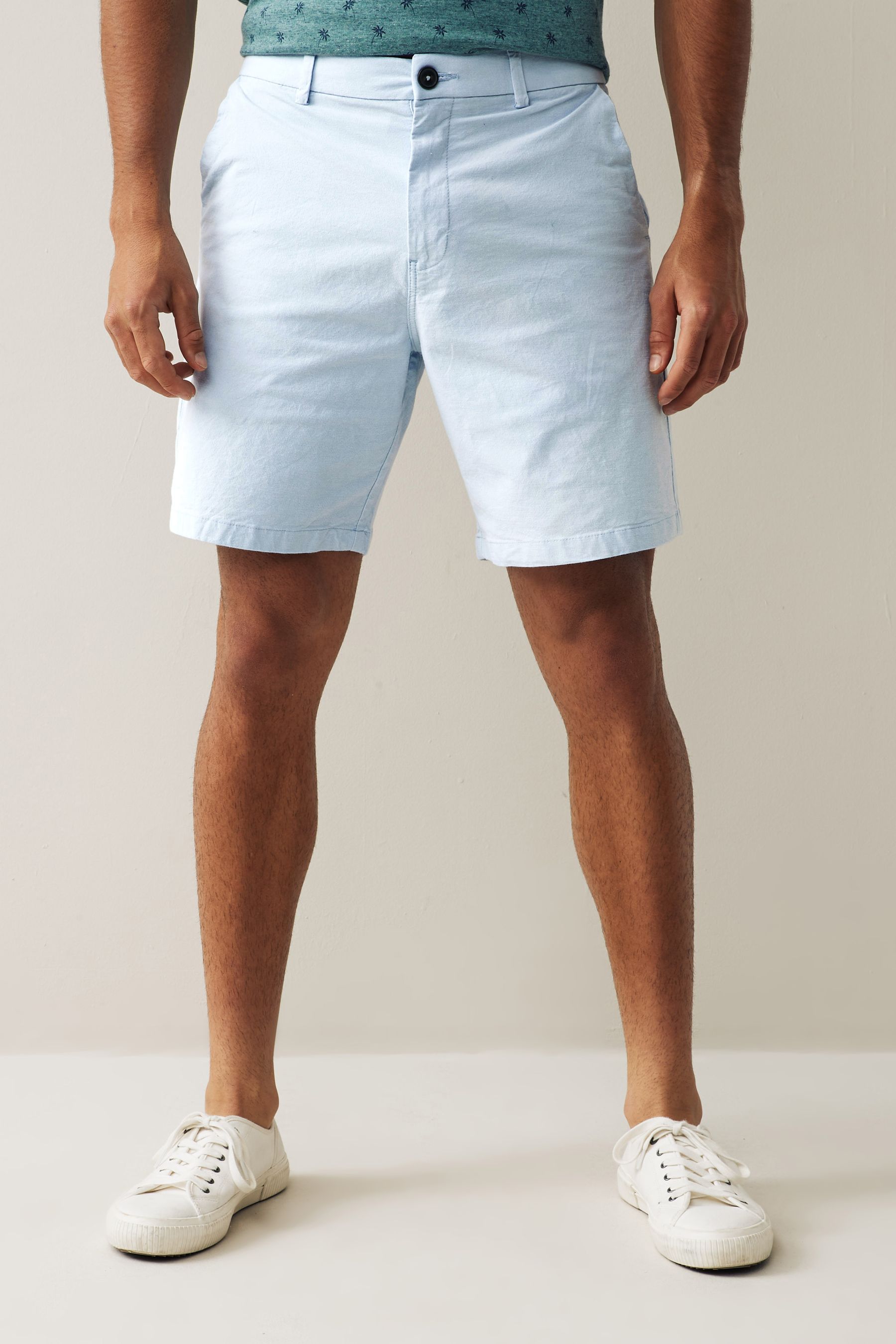Buy Light Blue Oxford Loose Stretch Chino Shorts from Next Luxembourg