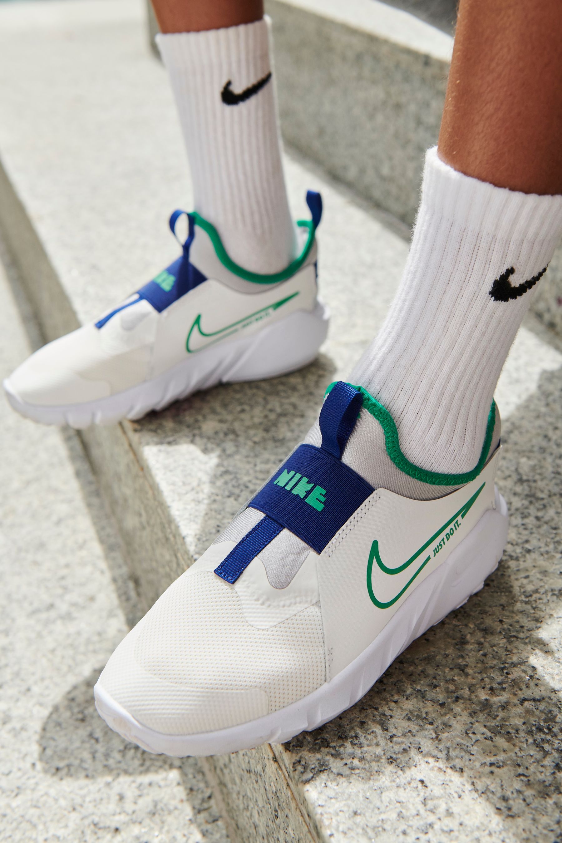 Buy Nike White Green Flex Runner Youth Trainers from Next Luxembourg