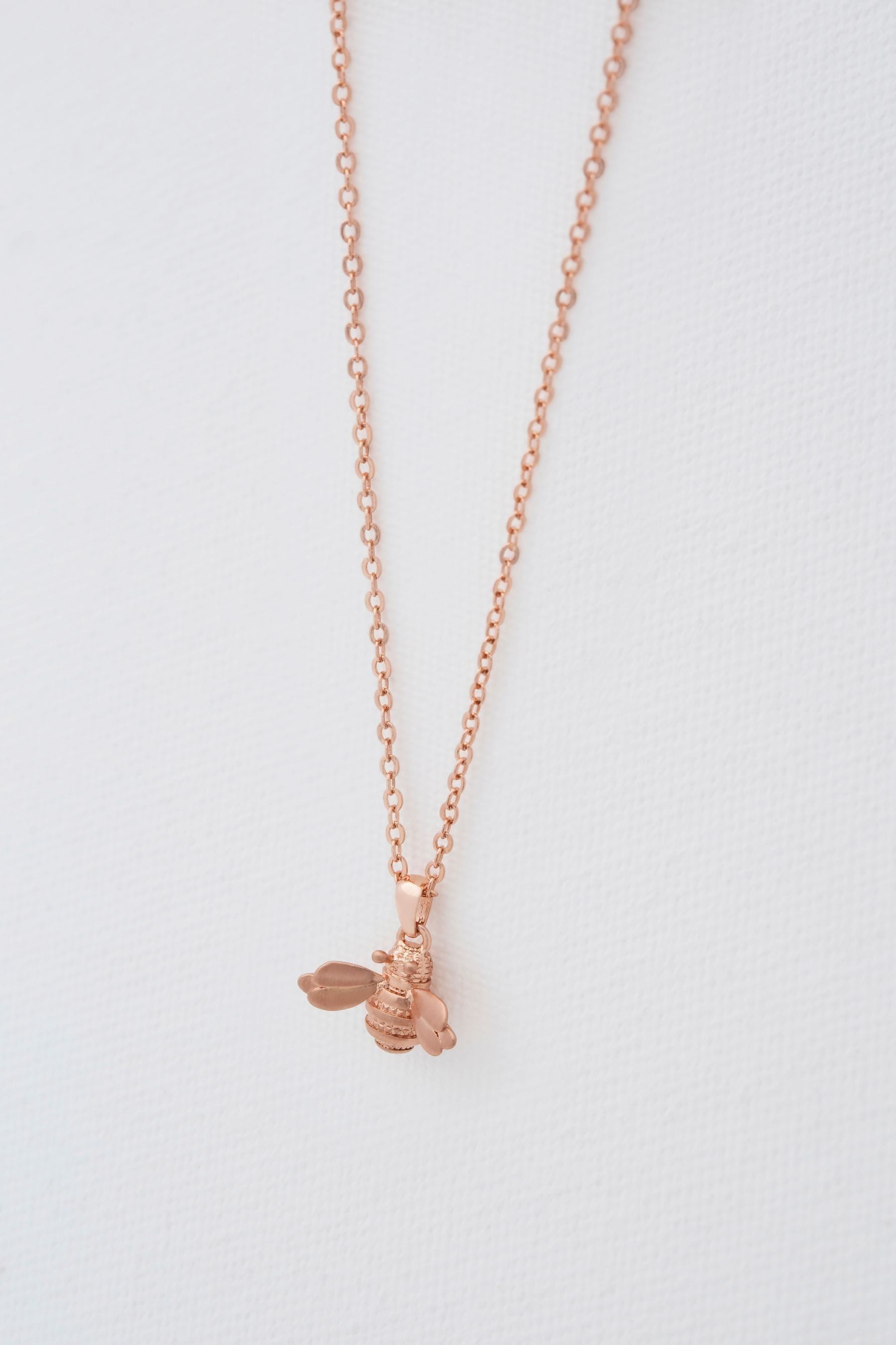 Kaufe Sie Ted Baker Rose gold farbene Bellema Bumble Bee Halskette mit Anhanger bei Next Deutschland