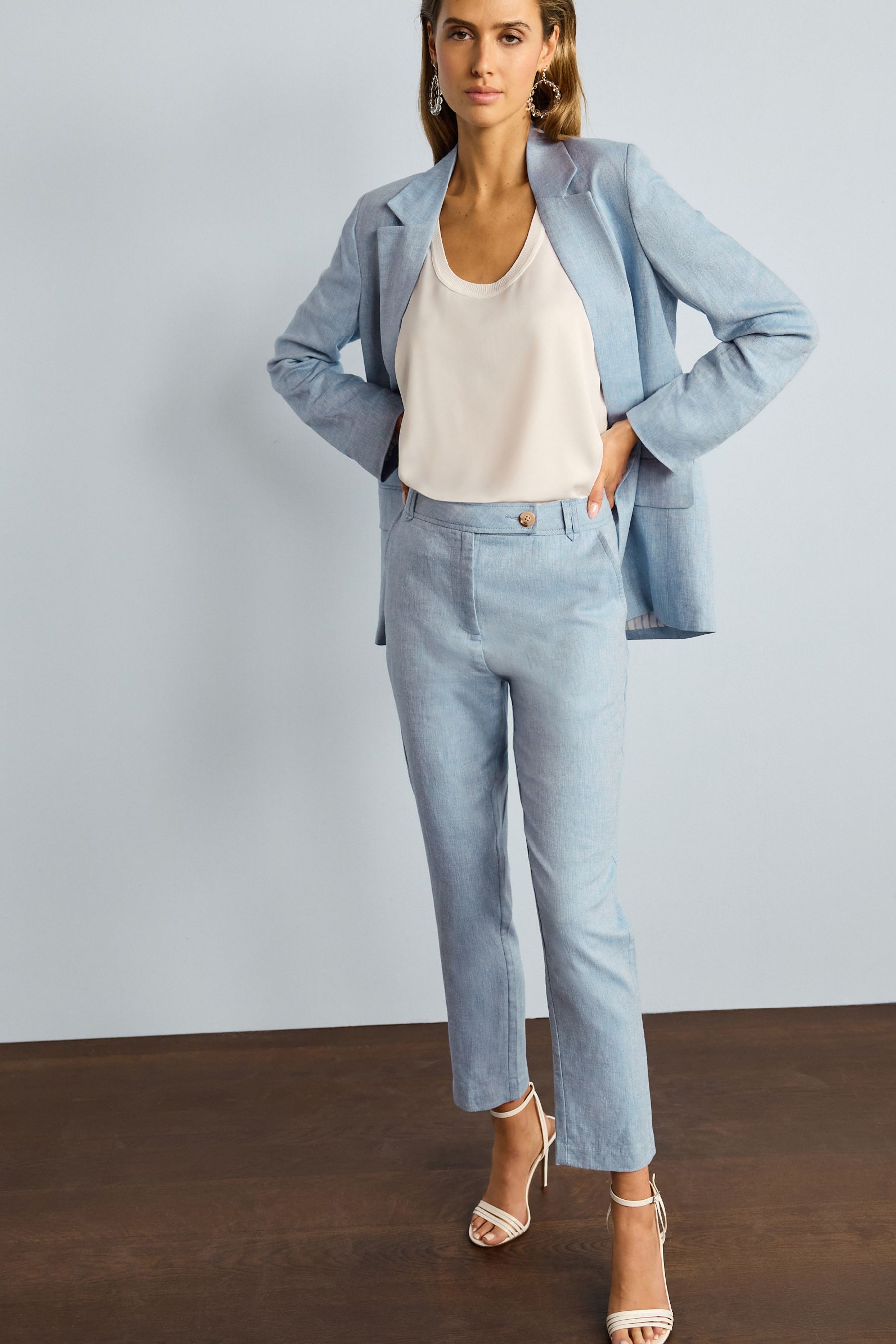 Buy Blue Linen Blend Textured Taper Trousers from Next Luxembourg