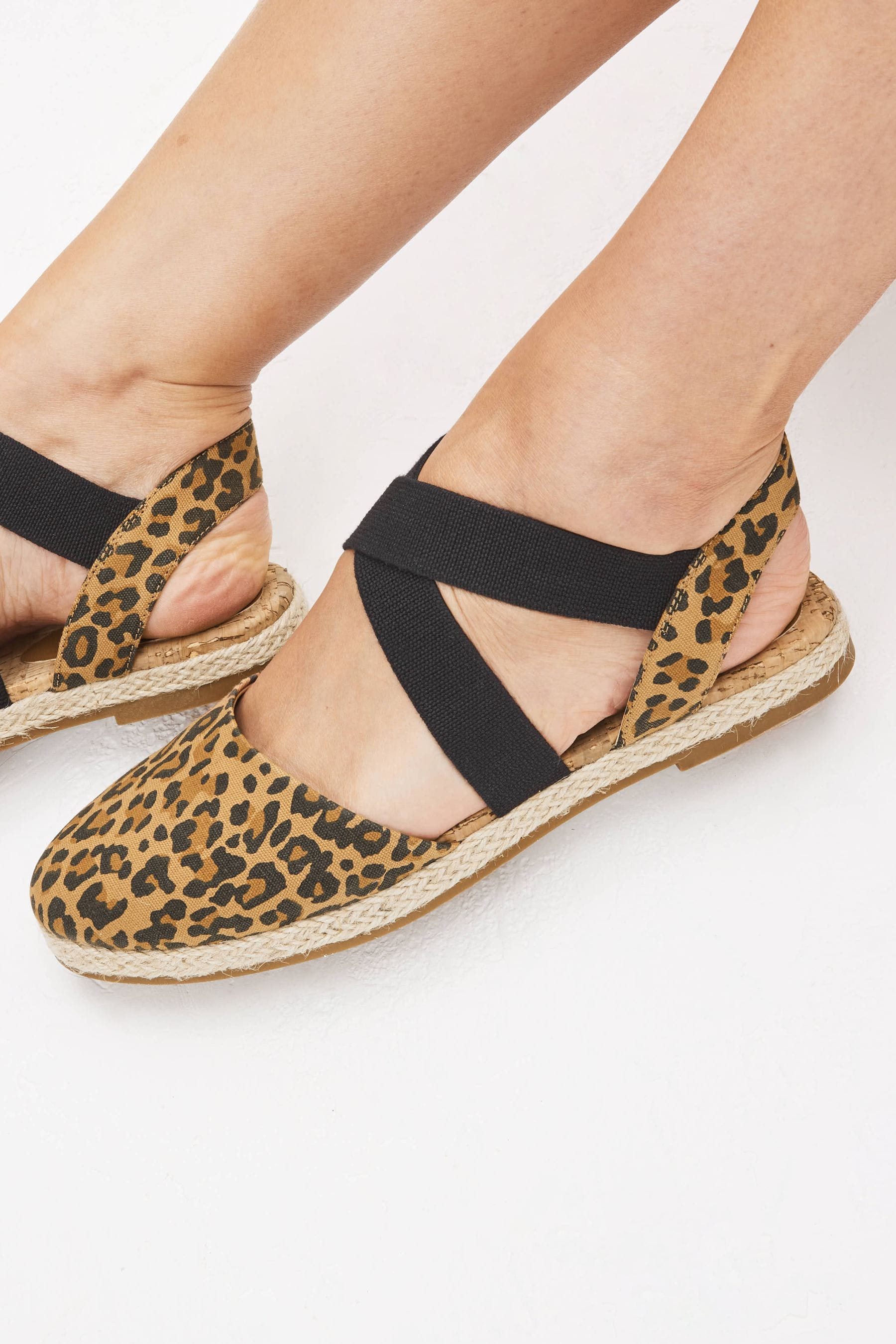 Buy Leopard Print Regular Wide Fit Espadrille Cross Over Flats from Next Luxembourg