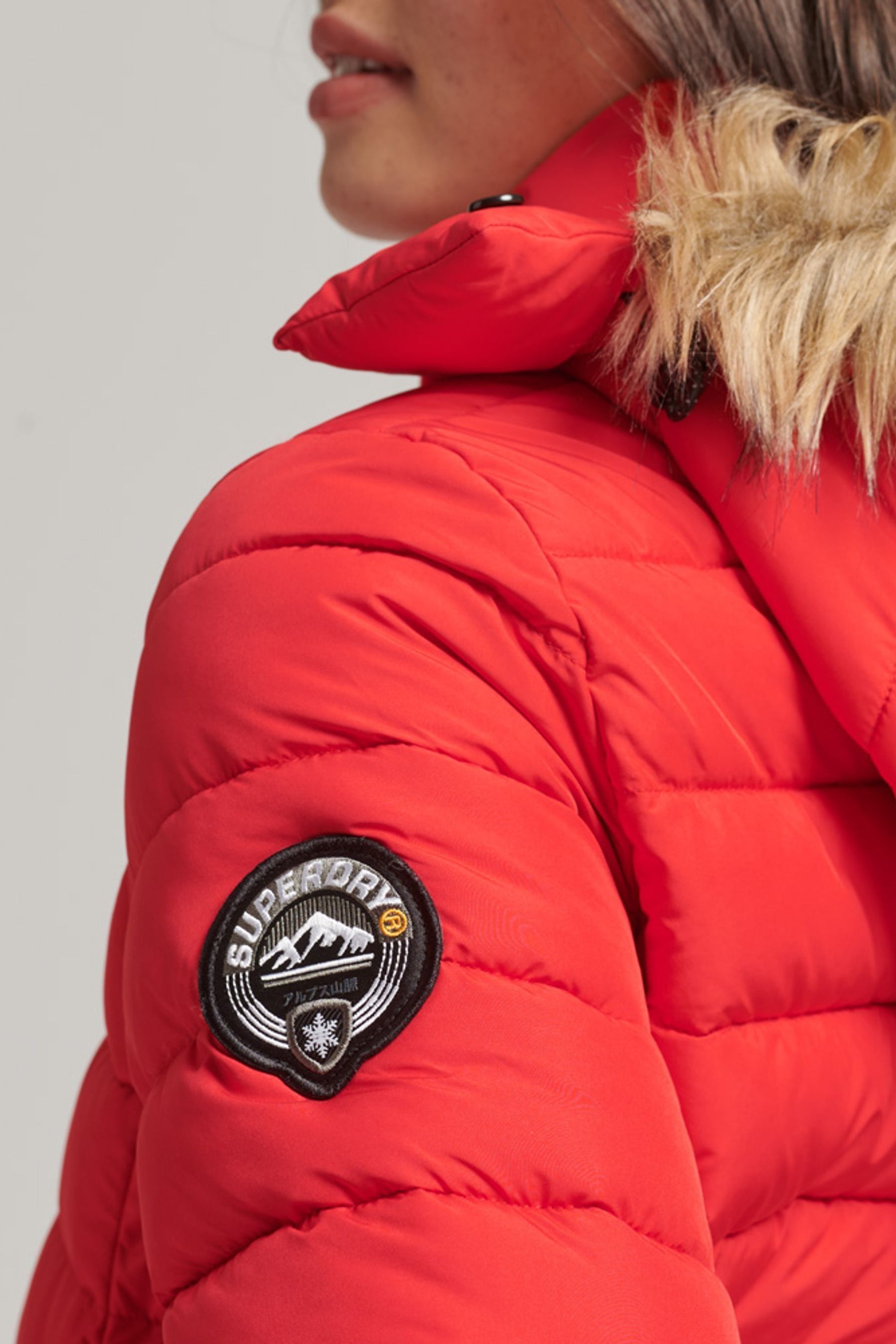 Buy Superdry Red Faux Fur Short Hooded Puffer Jacket from Next Luxembourg