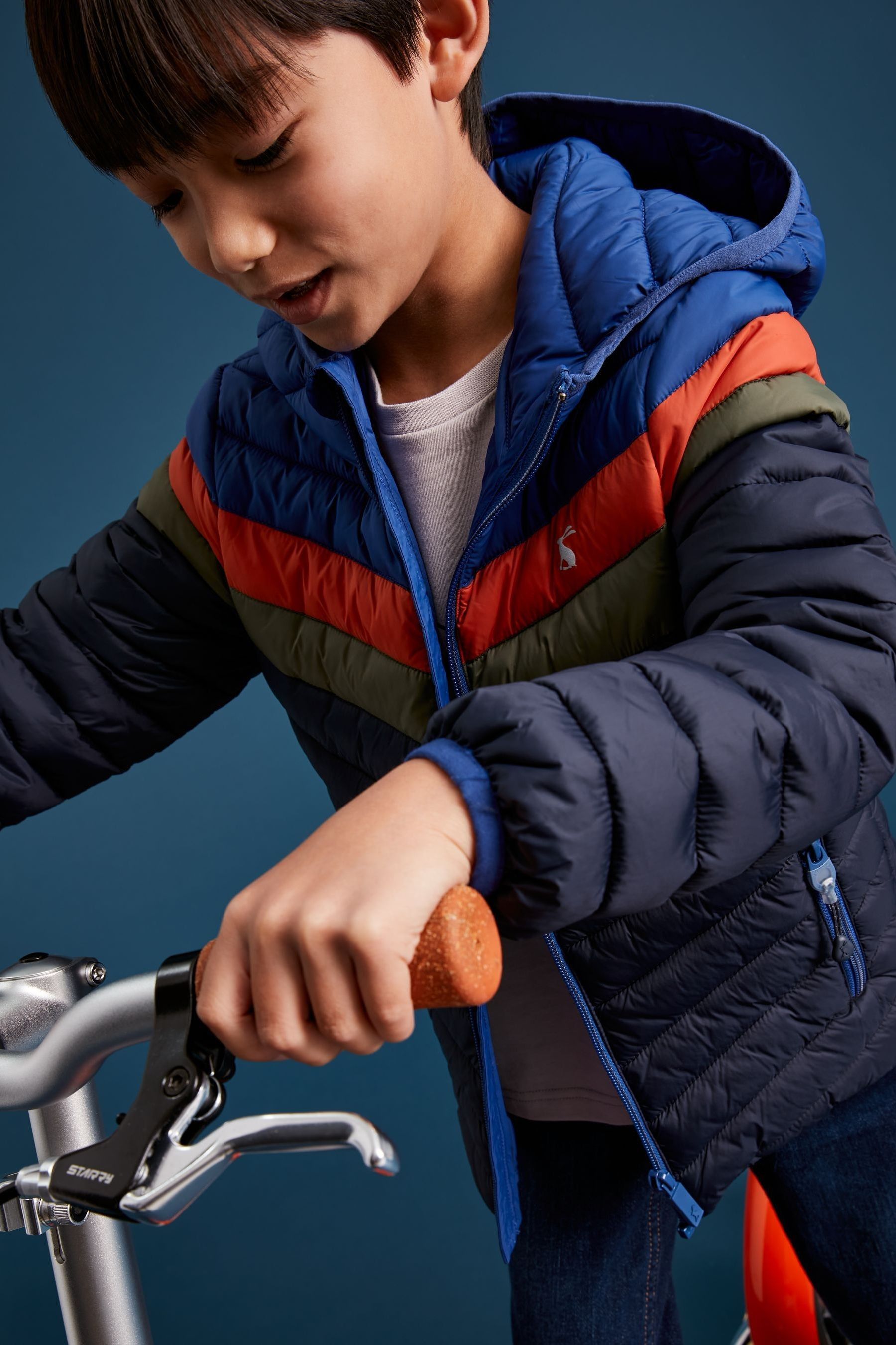 Buy Joules Blue Cairn Colourblock Showerproof Recycled Packable Padded Jacket from Next Luxembourg