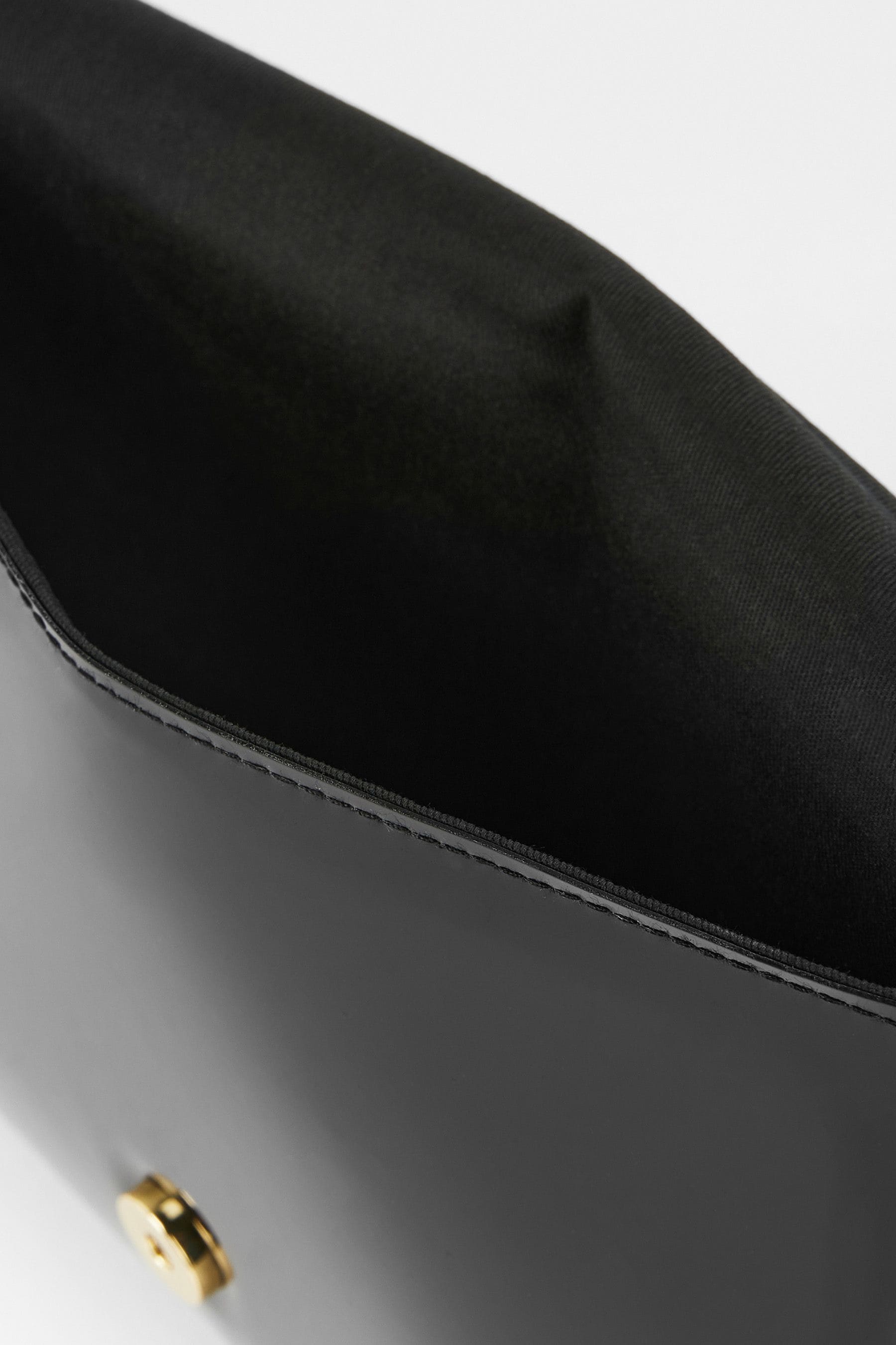 Buy Ted Baker Black Nikkey Knot Bow Envelope Pouch from Next Germany