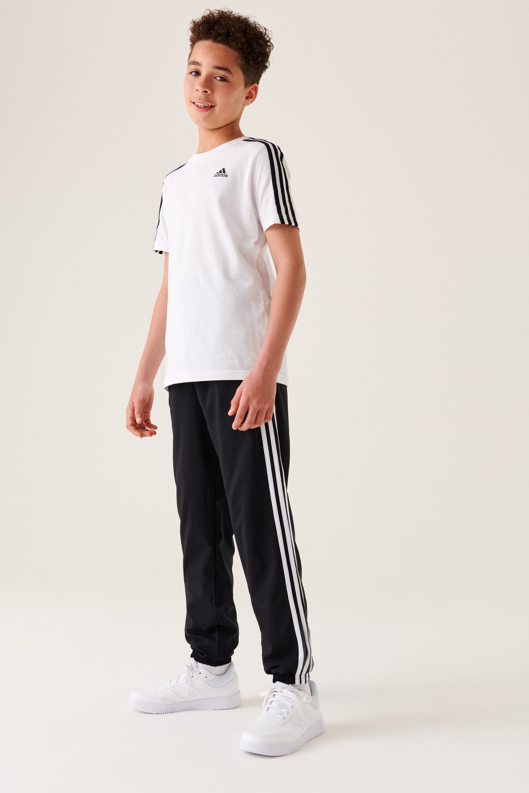 Buy adidas Black Sportswear Essentials 3 Stripes Woven Joggers from Next USA