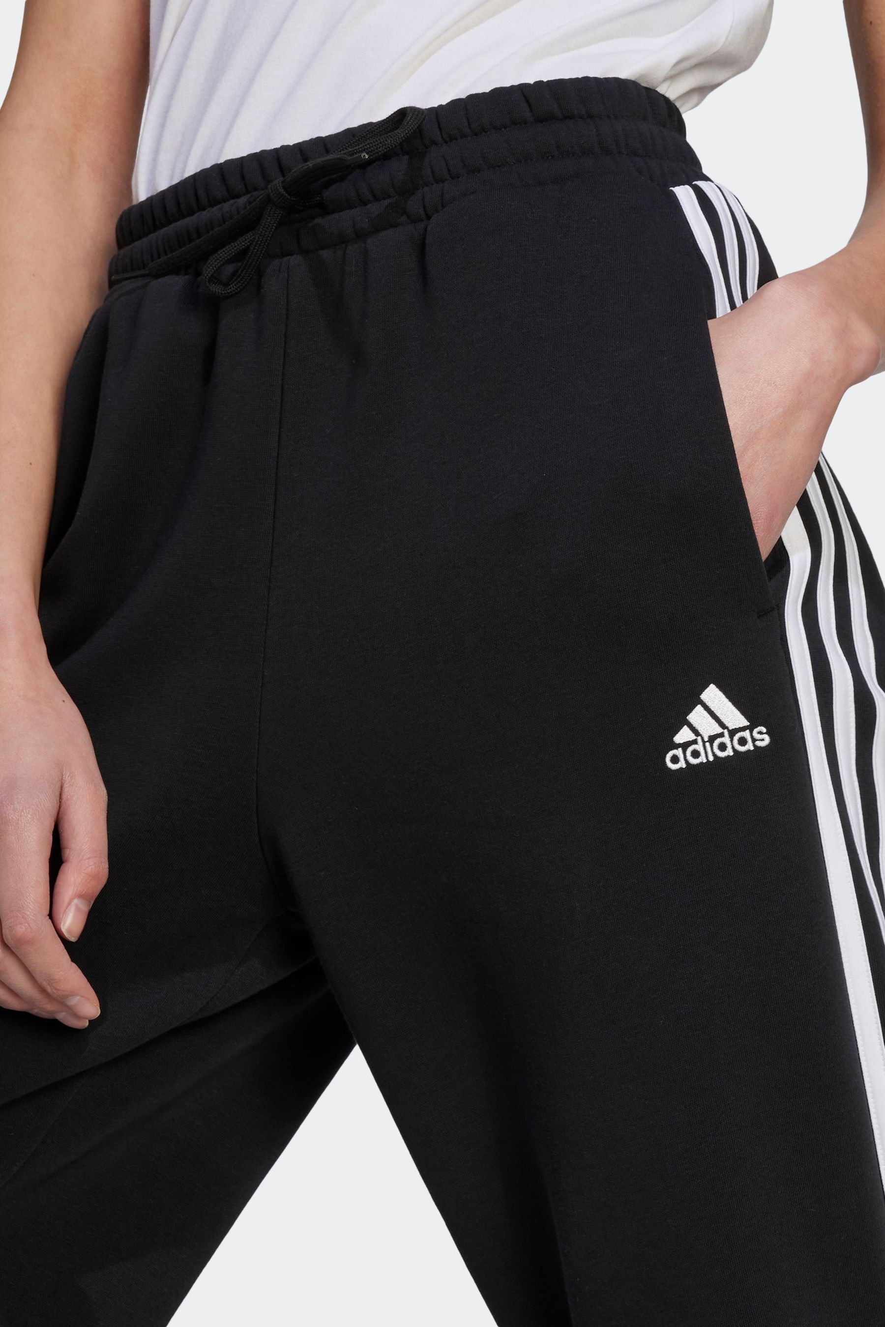 Buy adidas Black Sportswear Essentials 3 Stripes Open Hem Fleece Joggers from Next Canada