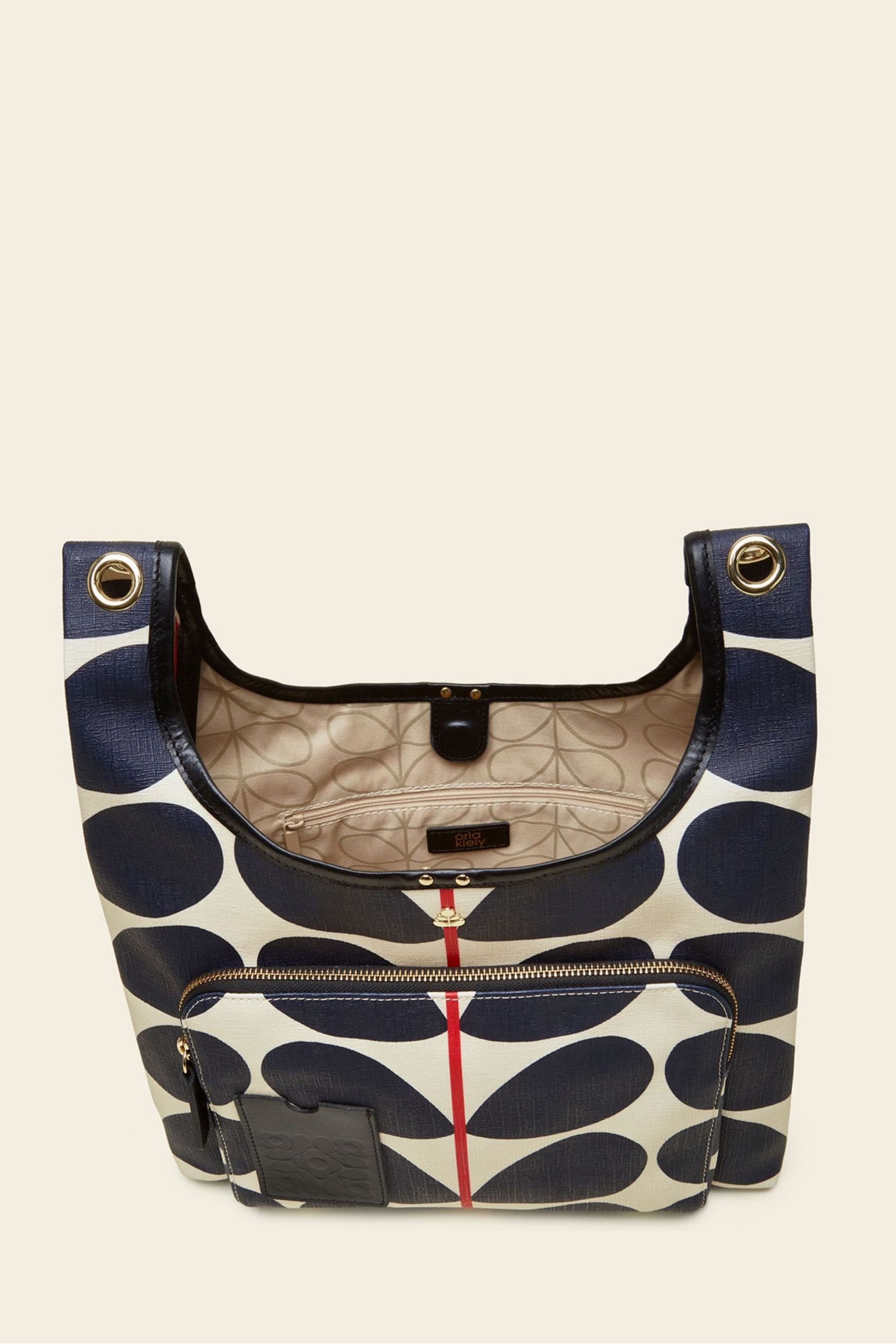 Orla kiely midi sling bag shop